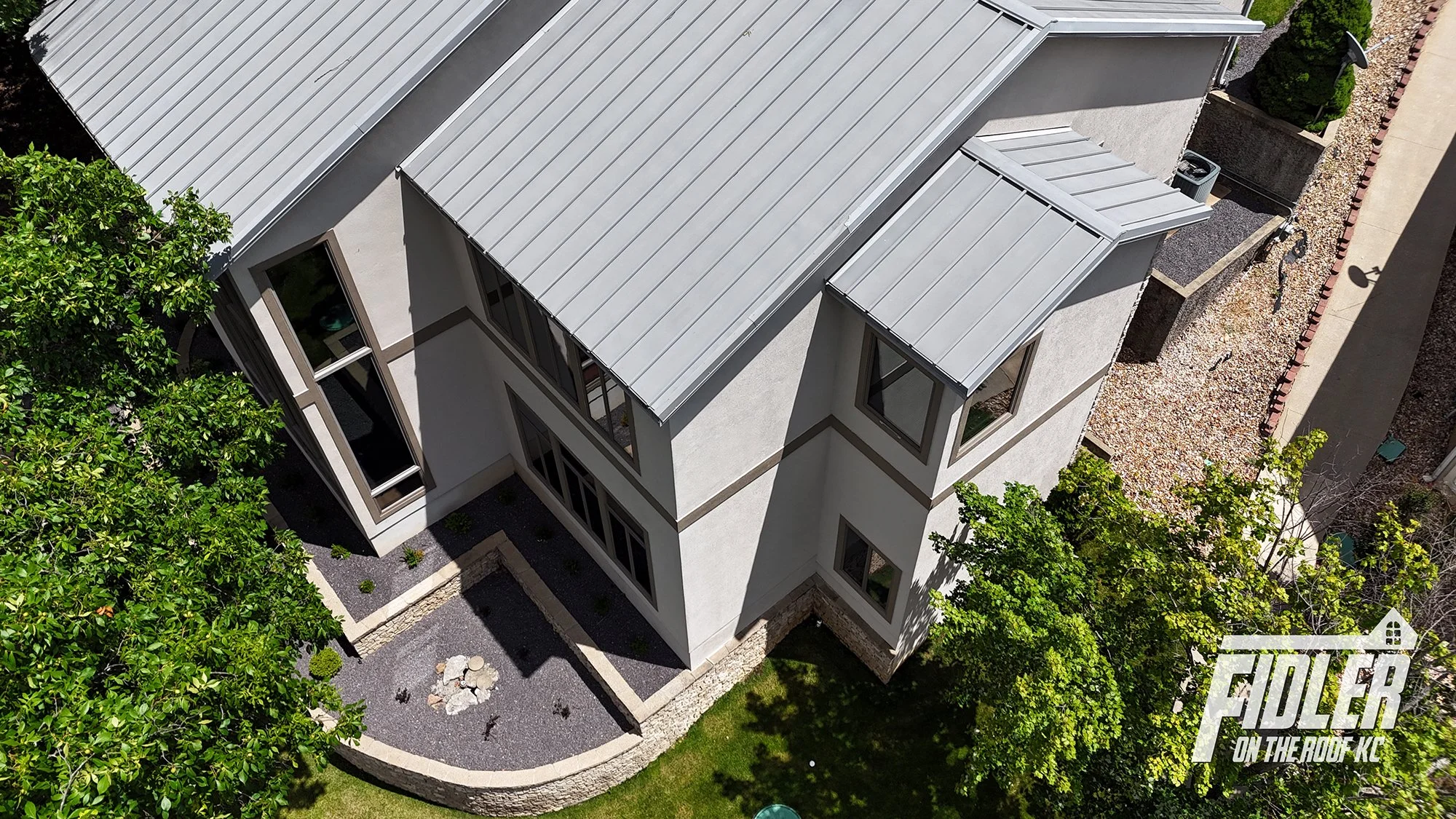 Standing-seam metal roofing, installed by Fidler on the Roof KC Roofing Co.