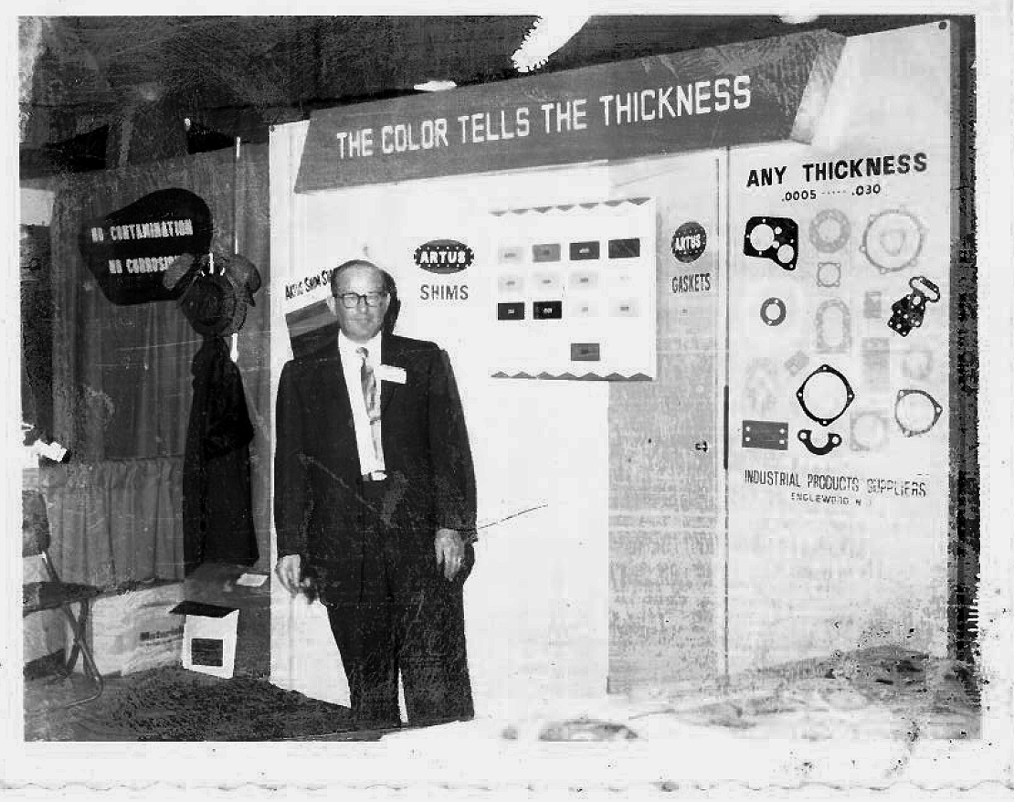 Manfred Katzenstein, Founding Partner of Artus Corp. at a Trade Show on April 15, 1958