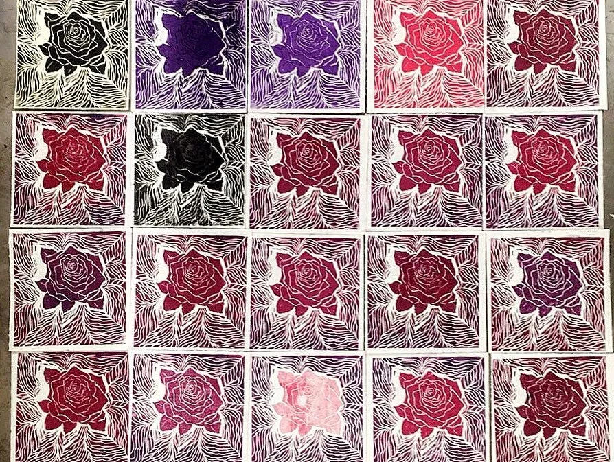 20 separate linoleum block prints for class exchange