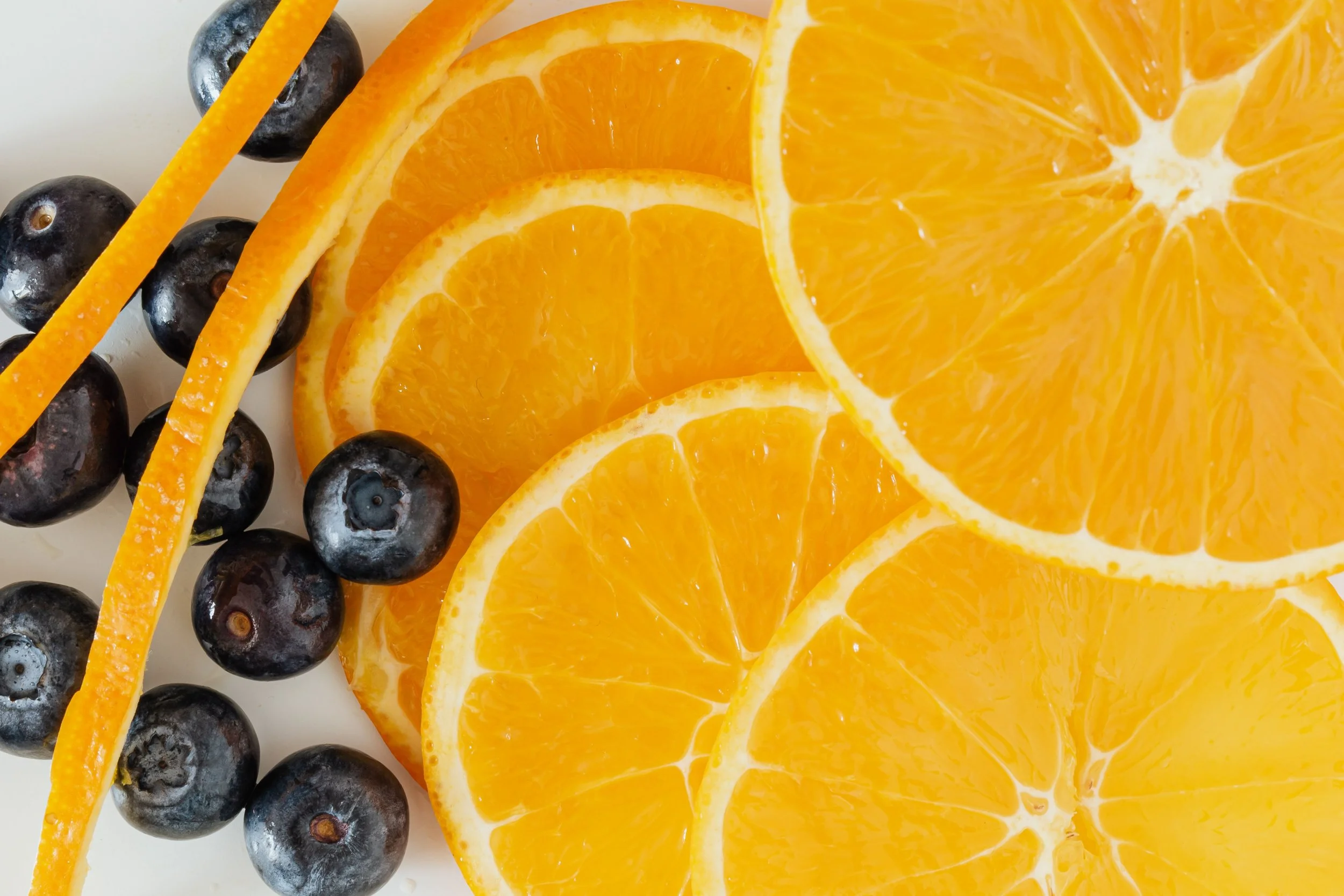 some orange slices and blueberries