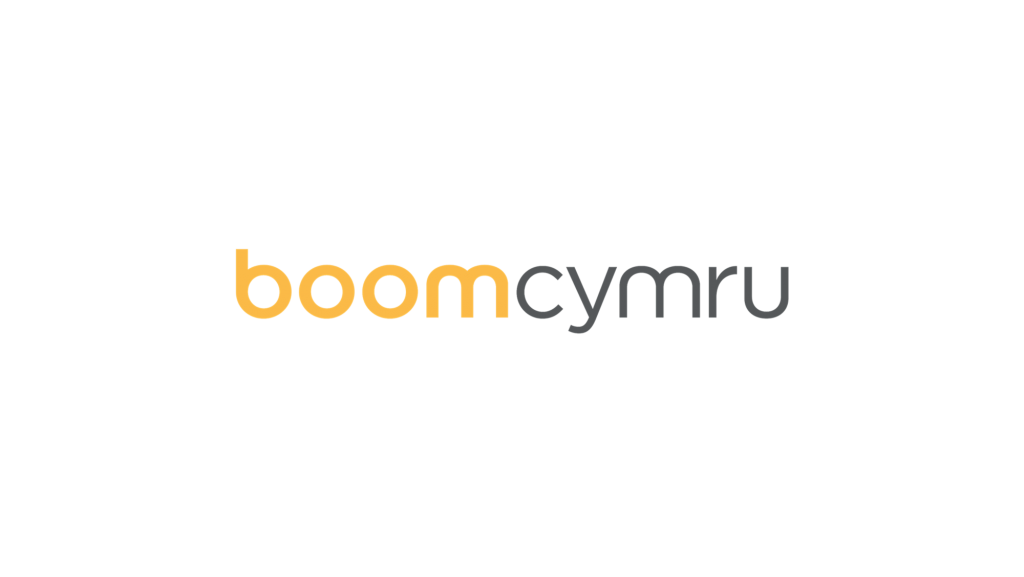 boom cymru logo with boom font in yellow and cymru font in black