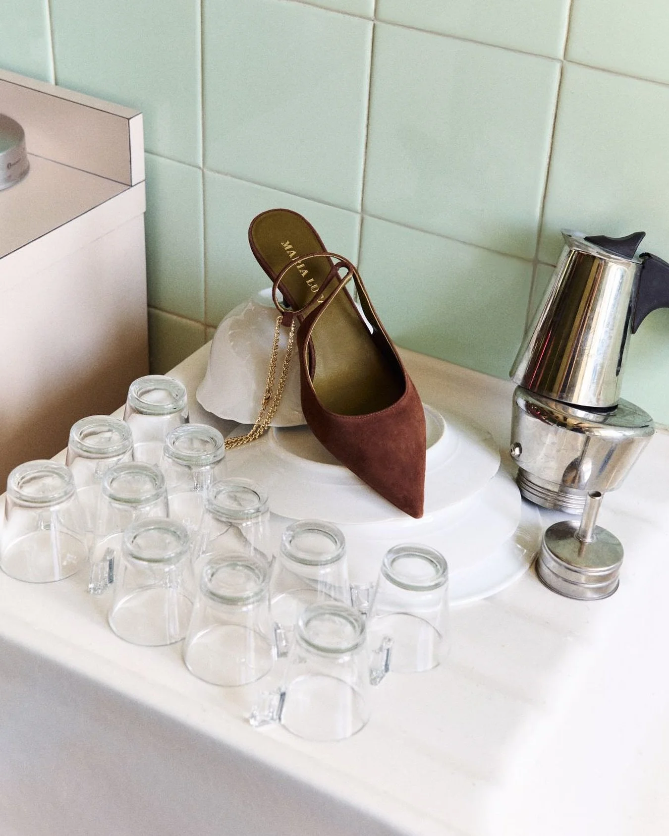 Soft suede and a gold accent.

Discover Felicia Slingbacks at maria-luca.com