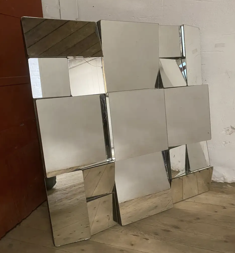 Manner of Neal Small Slopes Faceted Wall Mirror