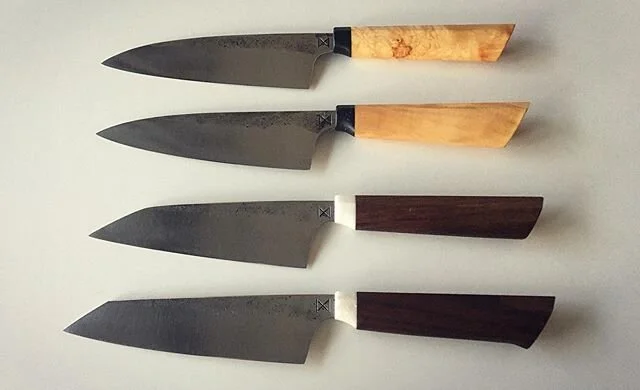 These 4 are kind of like siblings, very similar yet all a little different. +- 150mm blade and 120mm handle. 
#forgedsteel #forgedfinish #handforged #knifemaker #handmade #custom #cutlery #petty #chefknife #kitchenknife #kiritsuke #1.2419.05 #maplebu