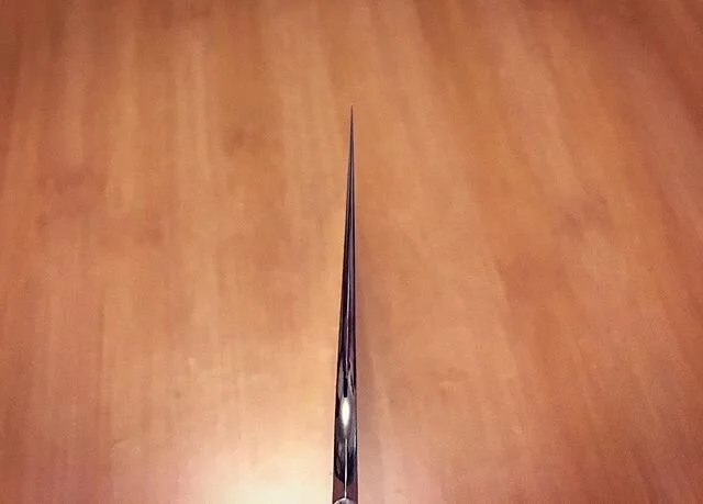 Choil shot of the geometry before sharpening... #forgedsteel #forgedfinish #handforged #knifemaker #handmade #custom #cutlery #demichef #kitchenknife #1.2842 #sharp #handmadebelgium