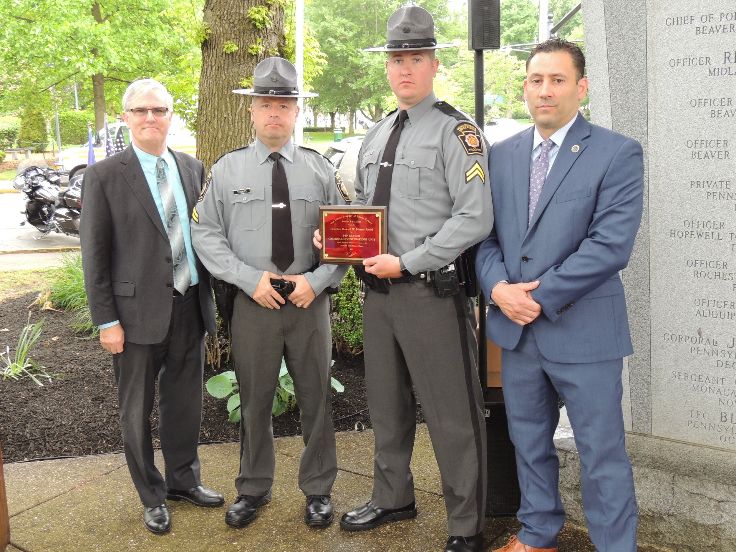 District Attorney David Lozier presents Detective Howard Murray Award to the Pennsylvania State Police Beaver Criminal Investigations Unit.