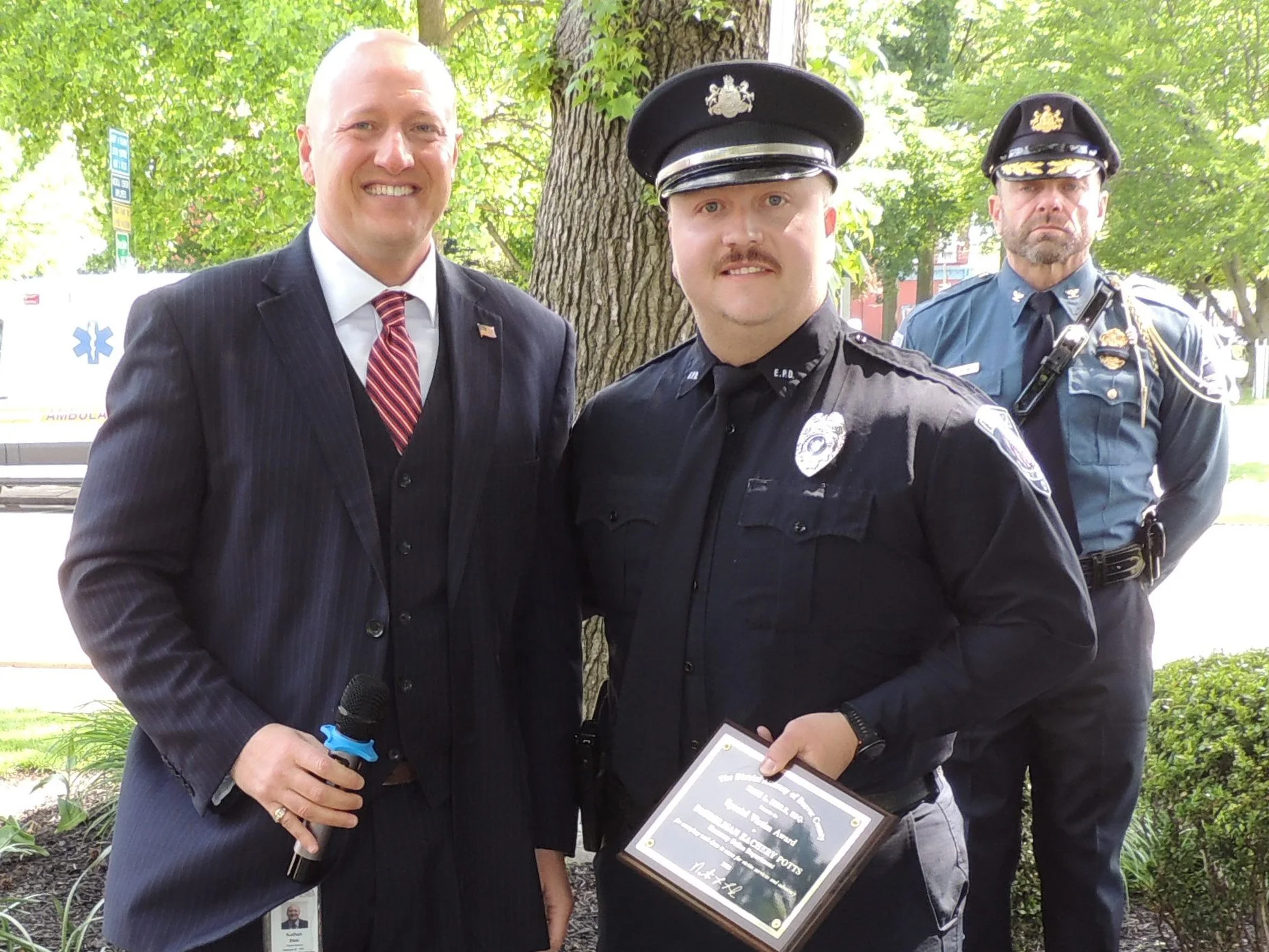  Nathan Bible (Beaver County District Attorney) presented Patrolman Zachary Potts (Economy Borough Police Department) with the Special Victim Unit Award. 