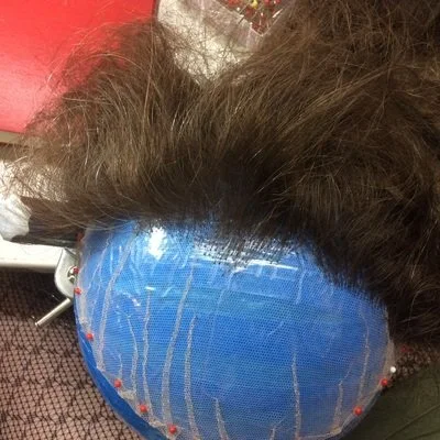 Fully ventilated wig for an opera singer at The Santa Fe Opera