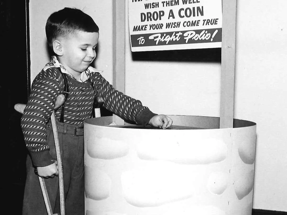 1957 MoD wishing well  w boy.jpg