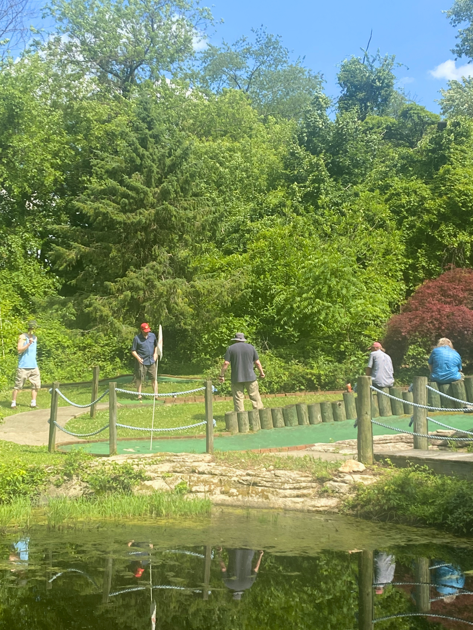Family playing mini golf at Hereford Golf Center