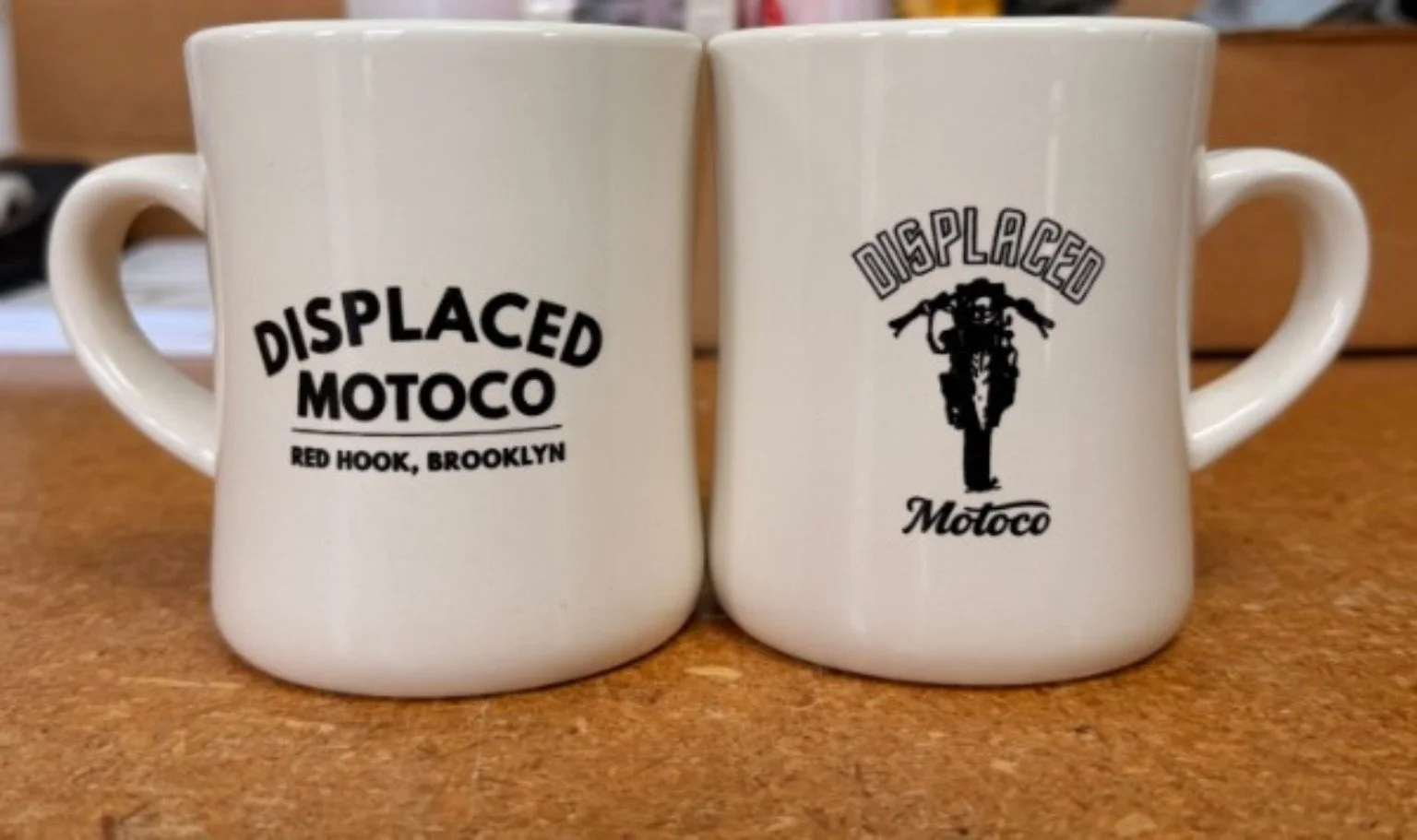 Displaced Motoco natural diner mug showing both printed sides