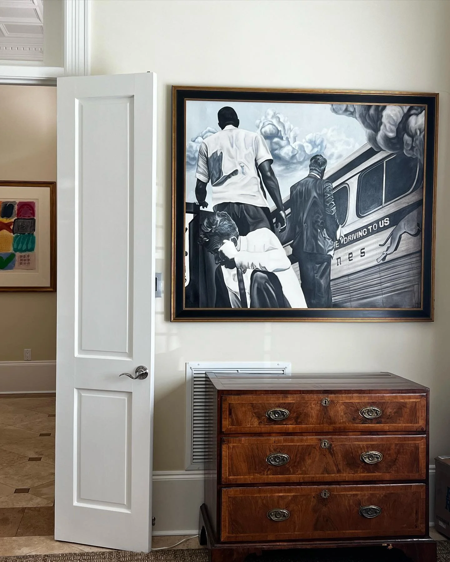 &ldquo;Driving to Where?&rdquo; 2020, framed and hanging in her new home. 
&bull;
Original photo from 1961, the Freedom Riders stopped outside of Anniston Alabama- a mob of klansmen slashed the tires and bombed the bus, attempting to trap the civil r