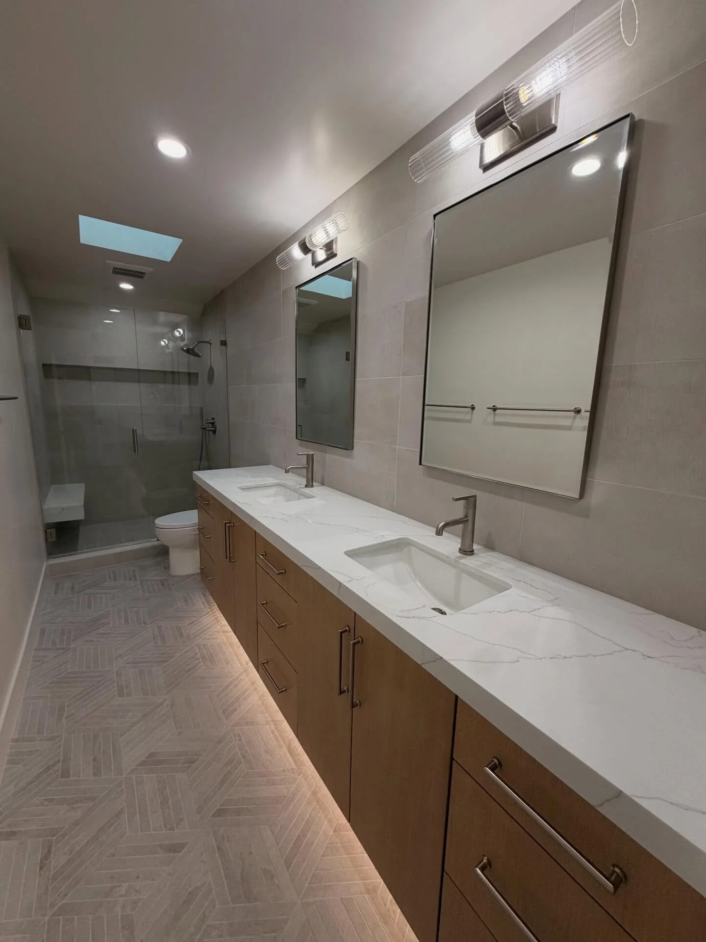 Bold geometry. Clean lines ✨
A bathroom that feels as good as it looks 🤍
#BathroomRemodel #ModernDesign #GeometricTiles #cleanlines