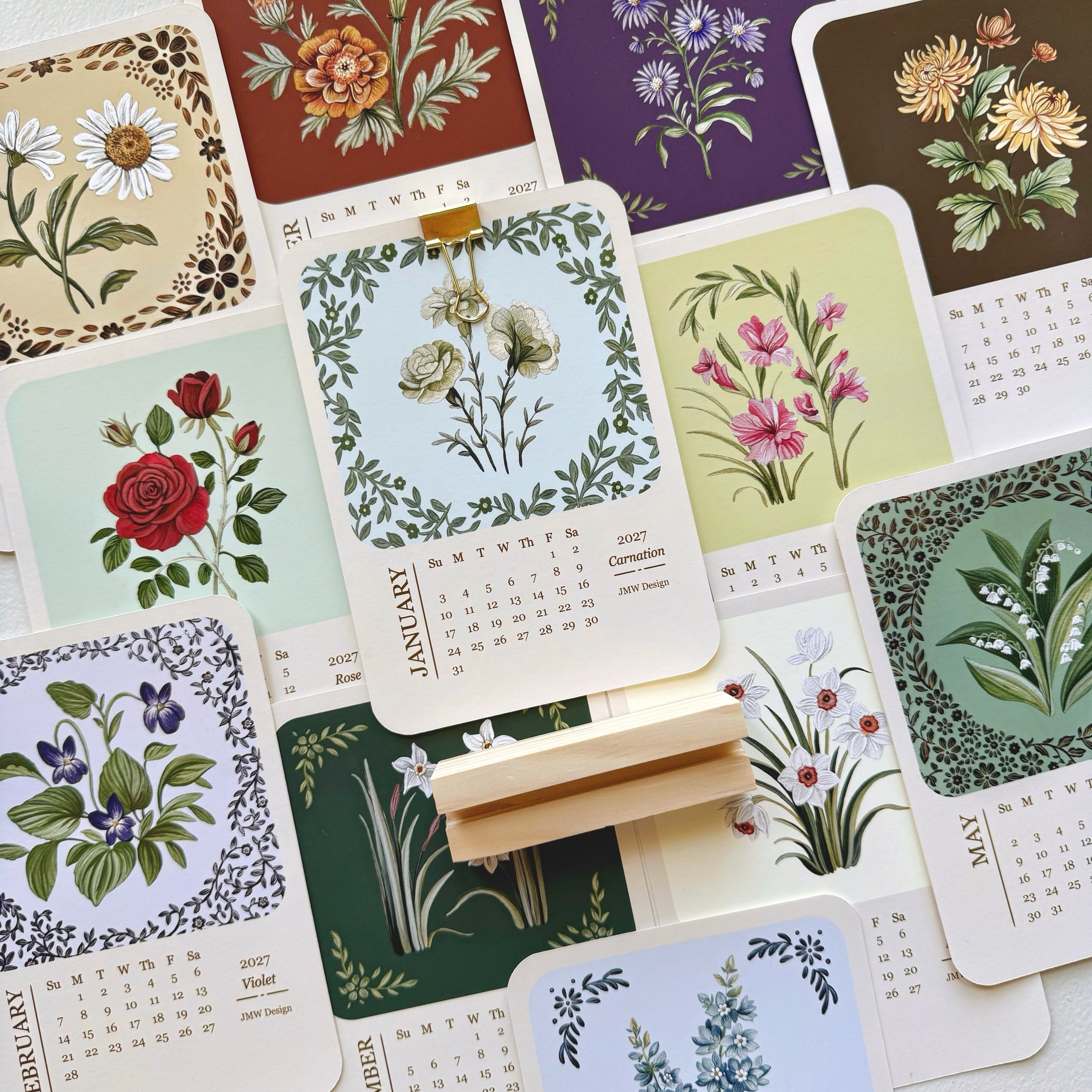 The 2027 calendar collection is OFFICALLY AVAILABLE TO COLLECT!!🥳🌸🌹Preorder the 2027 calendar, highlighting birth flowers throughout the year🌿 A Special Opportunity for Art Collectors: The original watercolor paintings featured throughout the cal