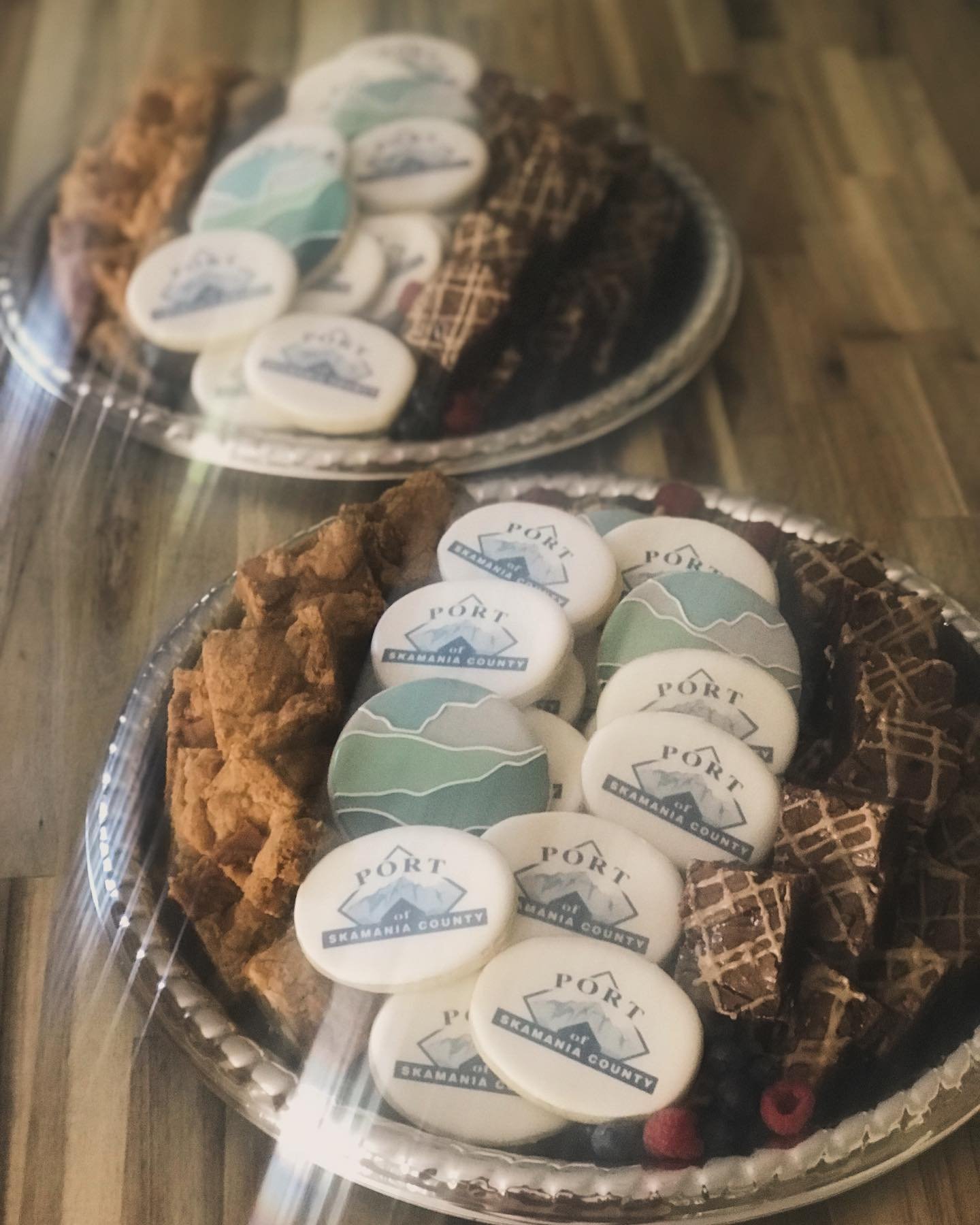 Sweet treats headed out for a Port event. 
Biscoff Cooke Butter blondes 
Salted Caramel Brownies and 
Port of Skamania County Logo Cookies. 

The tray decided to cast a glare, so I decided to just roll with it. Shine on.