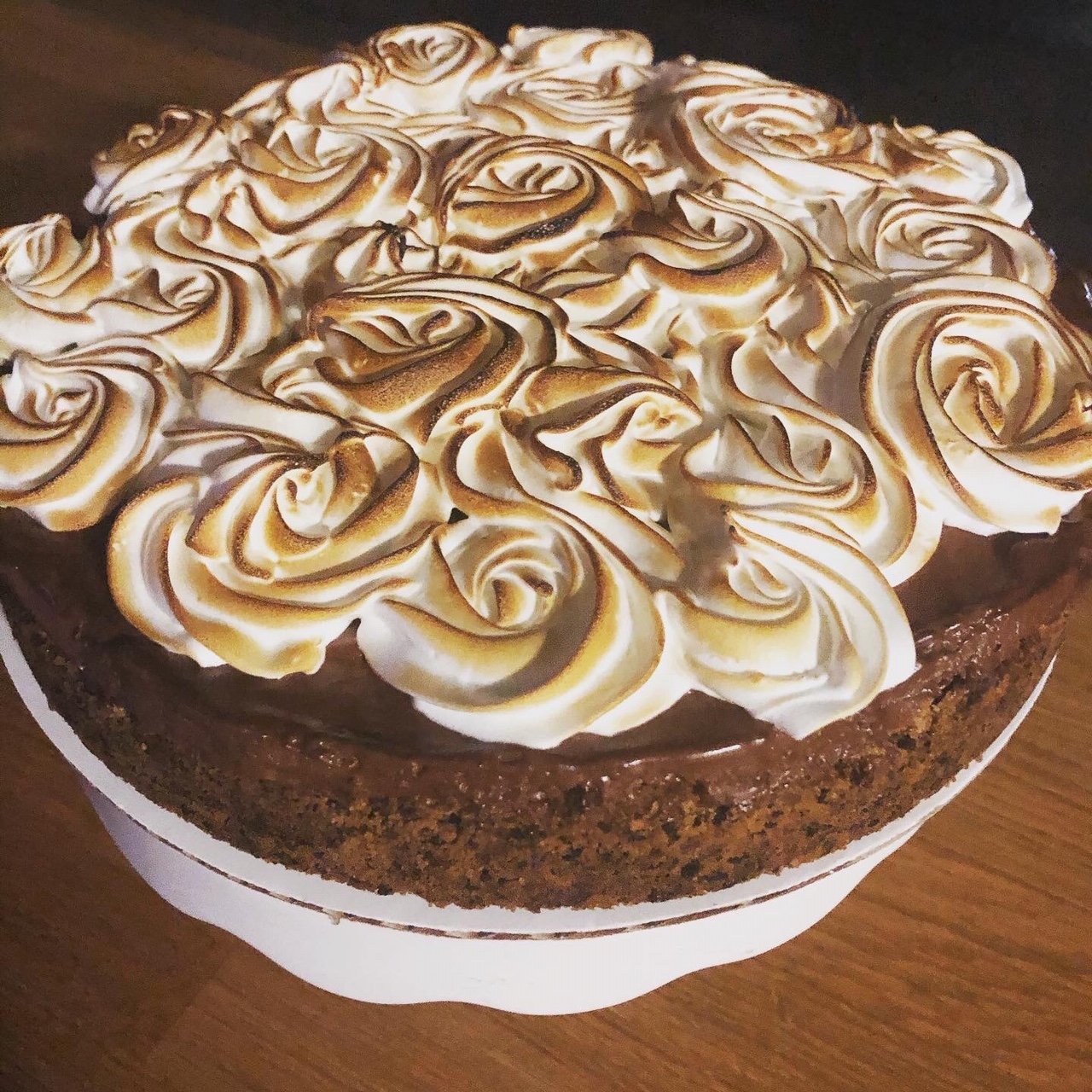 rose meringue on dark cake.JPG