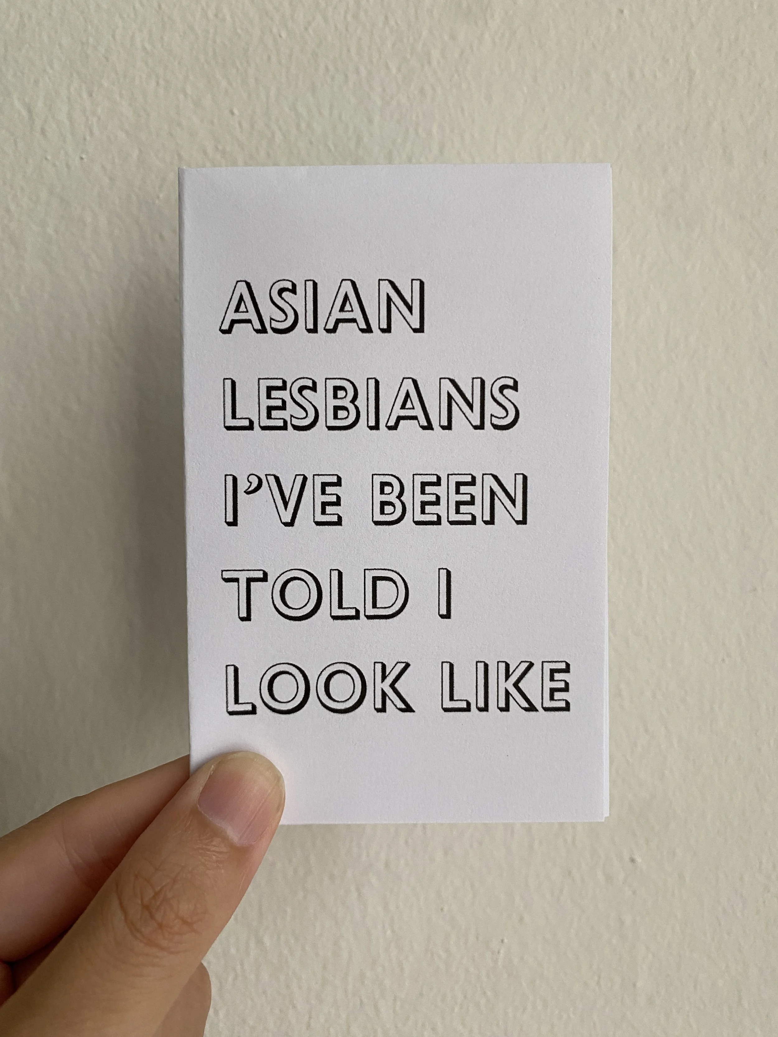 Large text that reads Asian Lesbians I've Been Told I Look like on a plain white cover.