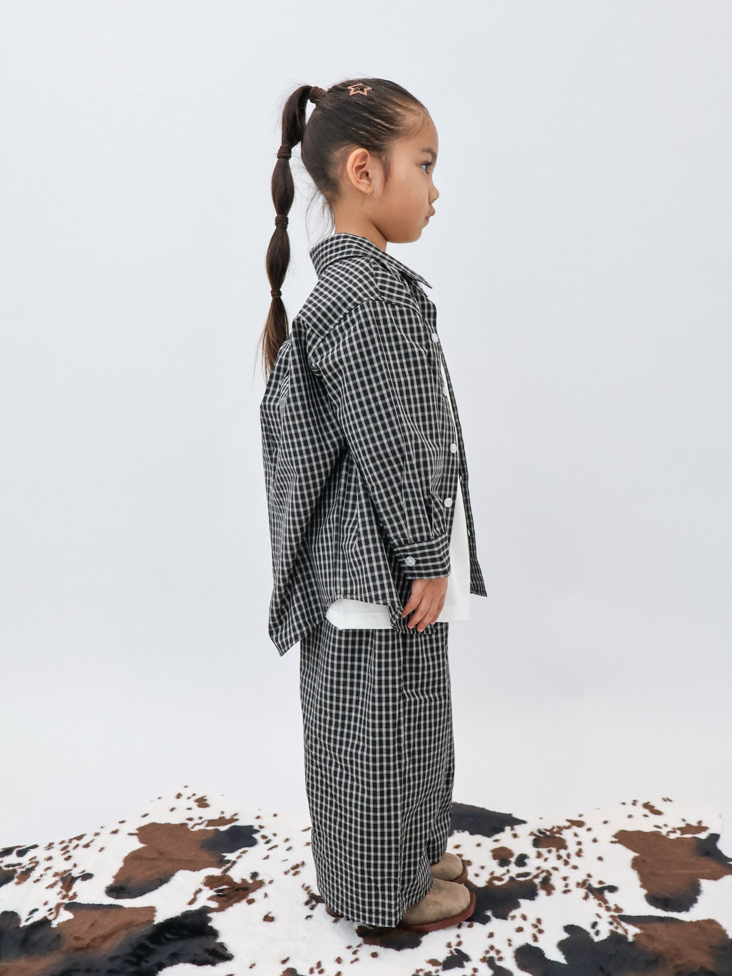 : borrowed-from-dad energy, but make it tiny 🖤

our vintage check shirt and pants in the colour onyx, from our latest AW26: DROP 01.