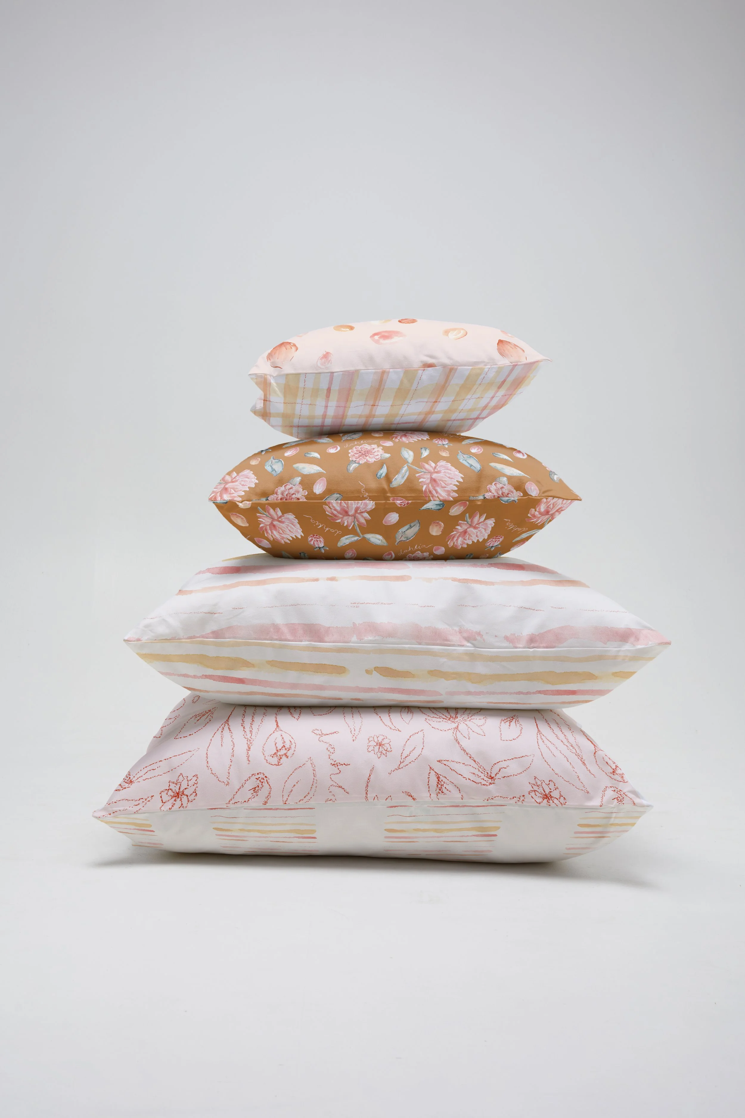 cushion stack pinks and peach mu.jpg