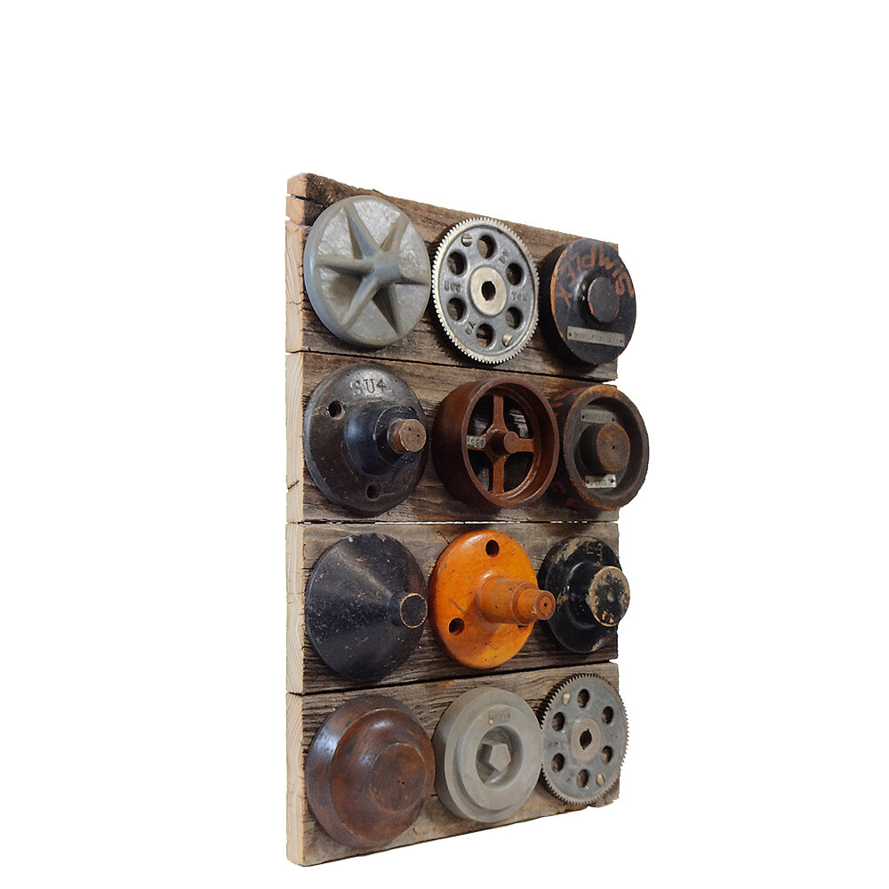Vintage Wall Art with Wooden Foundry Molds from the Left
