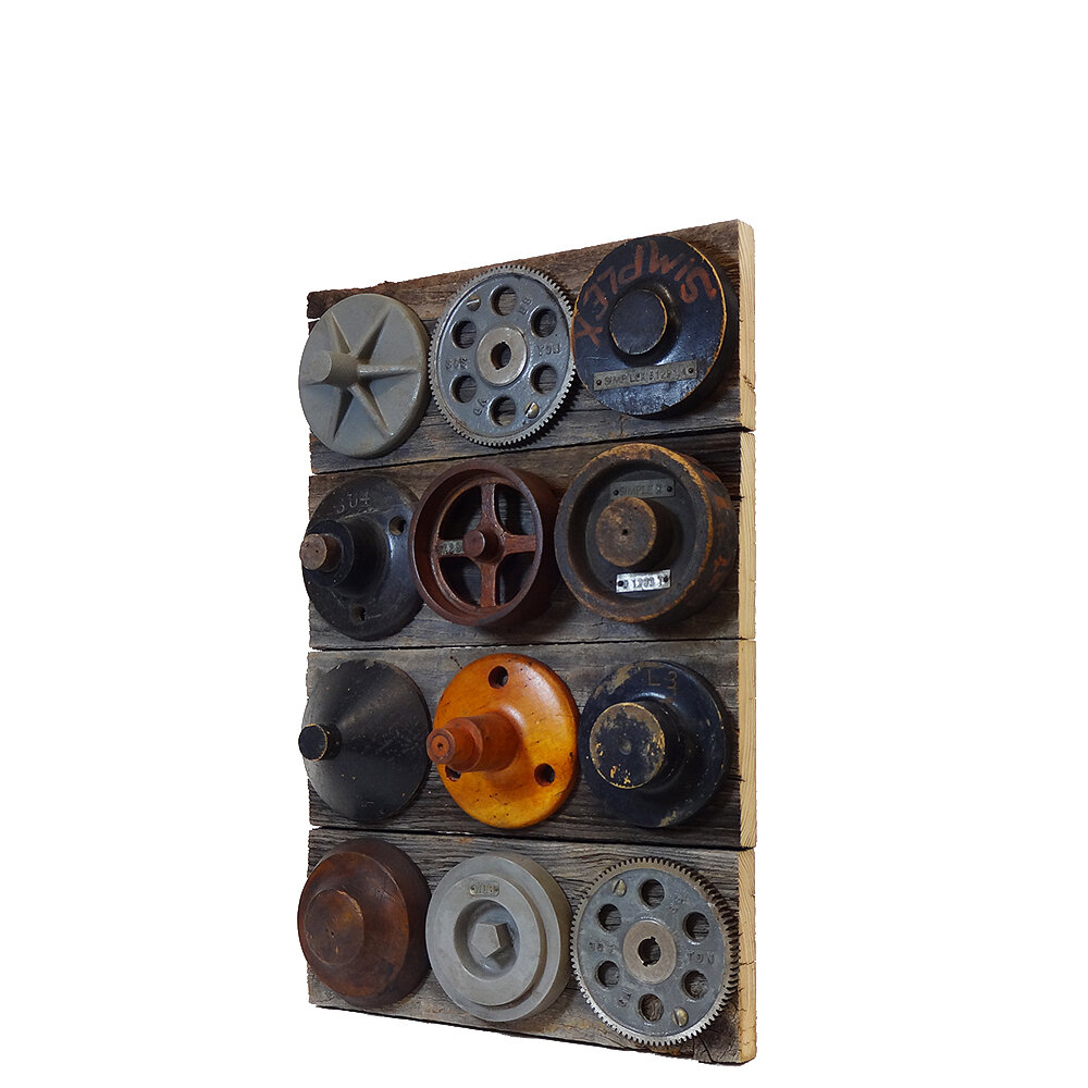 Vintage Wall Art with Wooden Foundry Molds from the Right