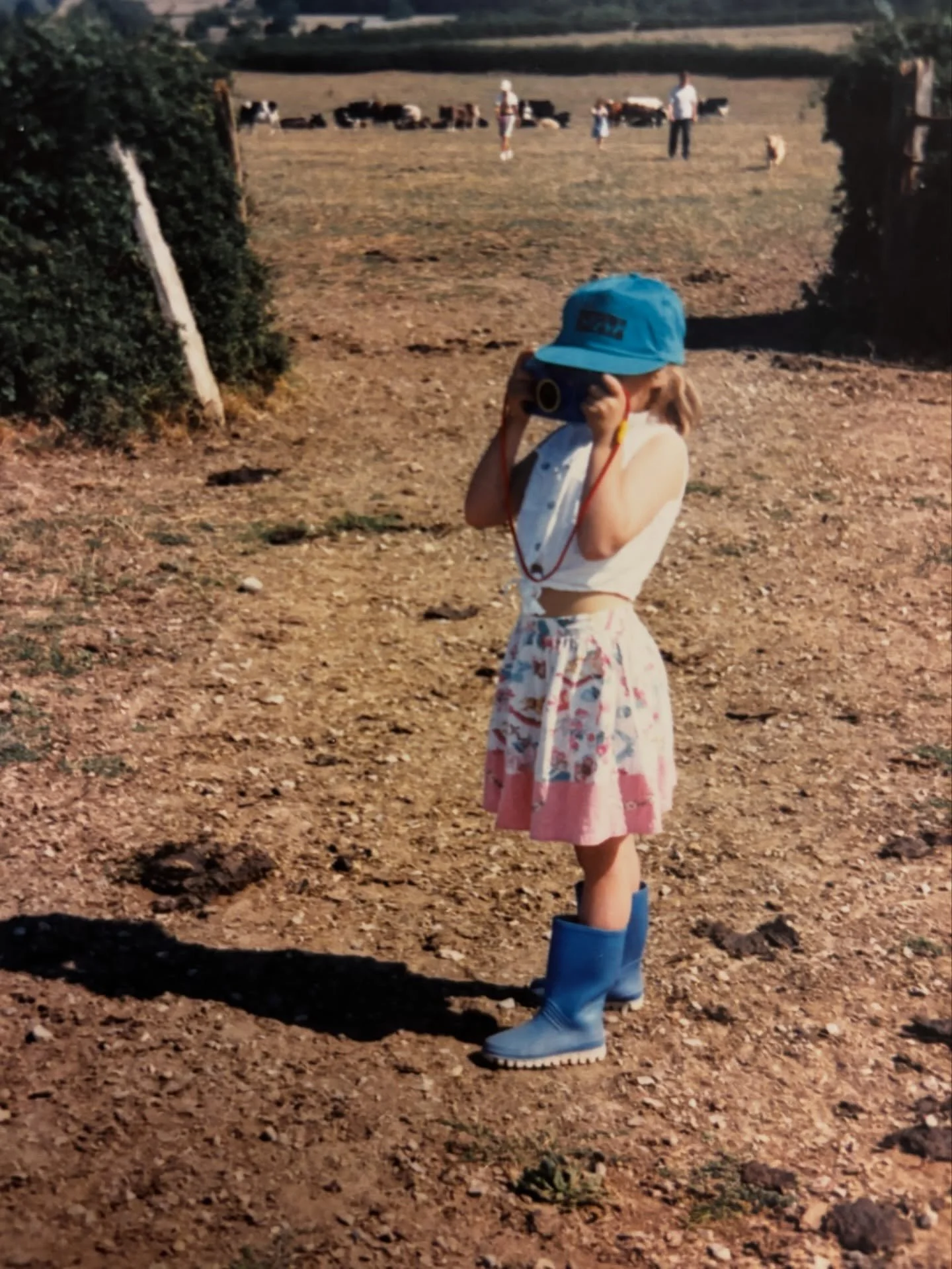 She&rsquo;s still taking pictures (but now for a living!), still loves a cap &amp; shorts/skirt, the countryside and the coast.

She&rsquo;s now also replying to your emails, capturing your wedding day, managing her own website, finances and business