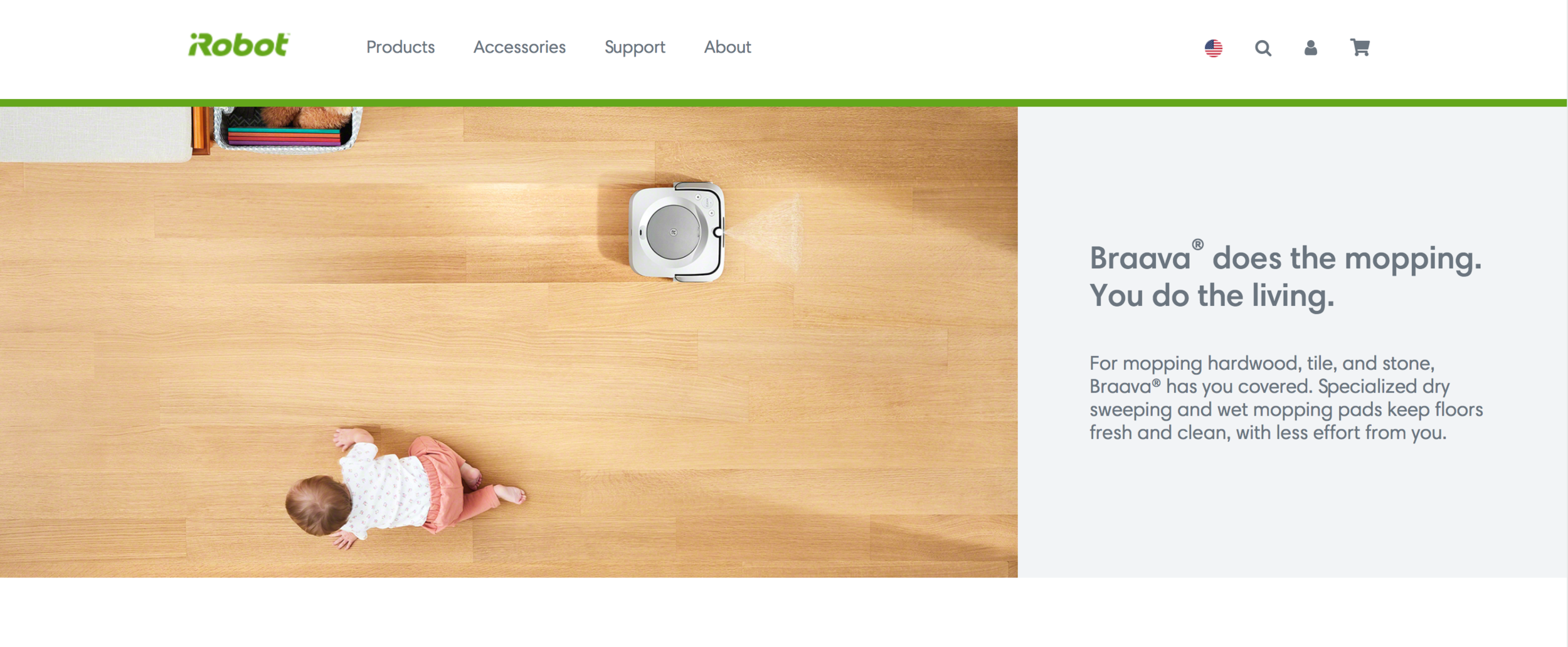 A robotic mop cleaning hardwood floors with a baby crawling nearby, and a shelf with books and toys in the background. A screenshot of iRobot's web site.