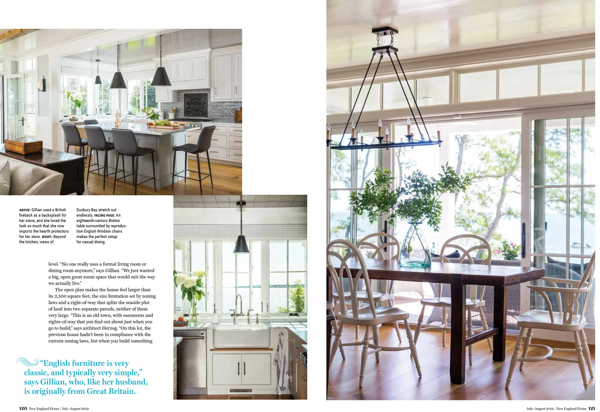 Bright kitchen and dining area with large windows, white cabinetry, dark pendant lights, farmhouse sink, and a wooden dining table with white chairs, and greenery inside.