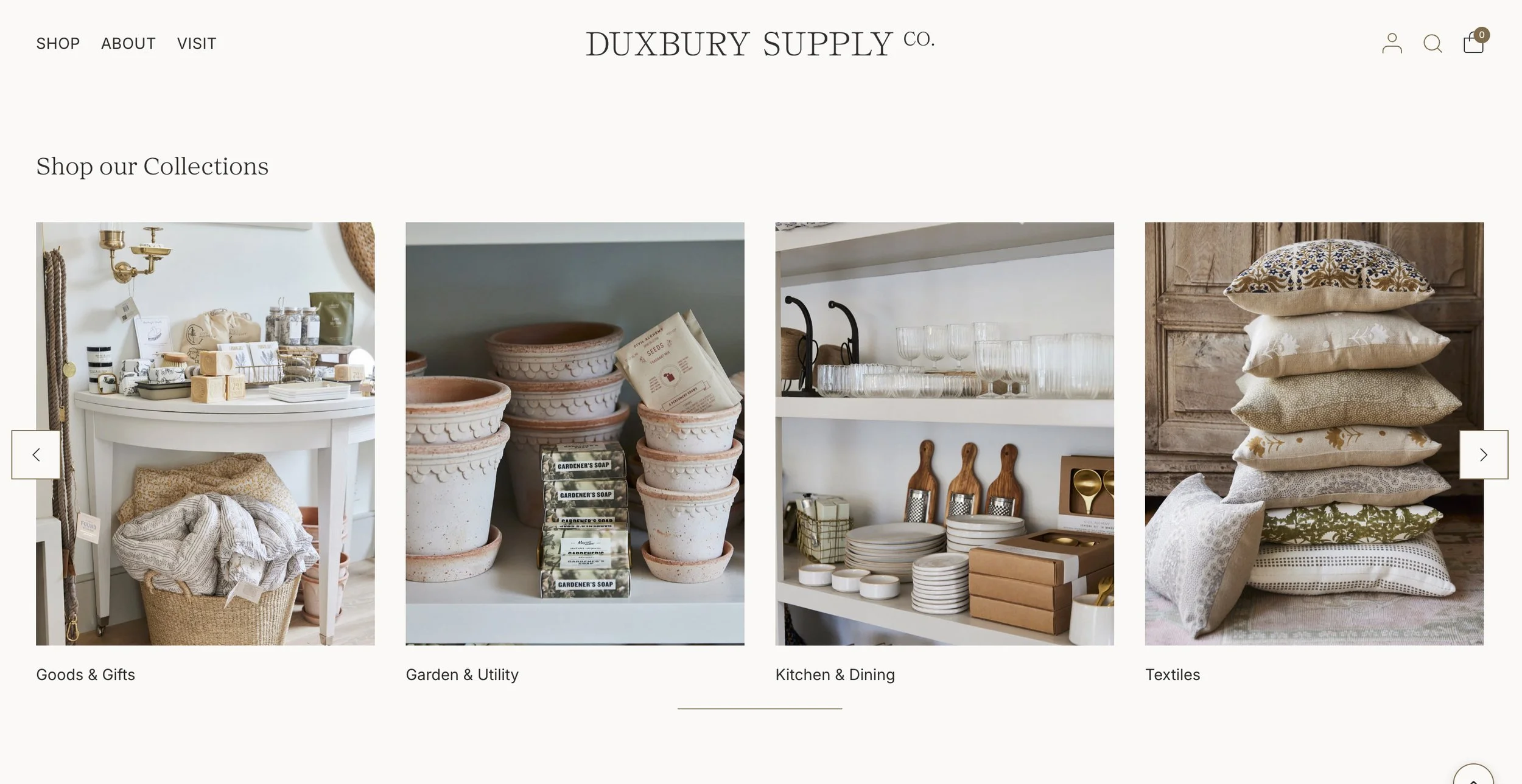 Online store homepage displaying categories: Goods & Gifts, Garden & Utility, Kitchen & Dining, Textiles, with products such as candles, soaps, dishes, cups, and pillows arranged on shelves and tables.  Screenshot of Duxbury Supply Co's web site