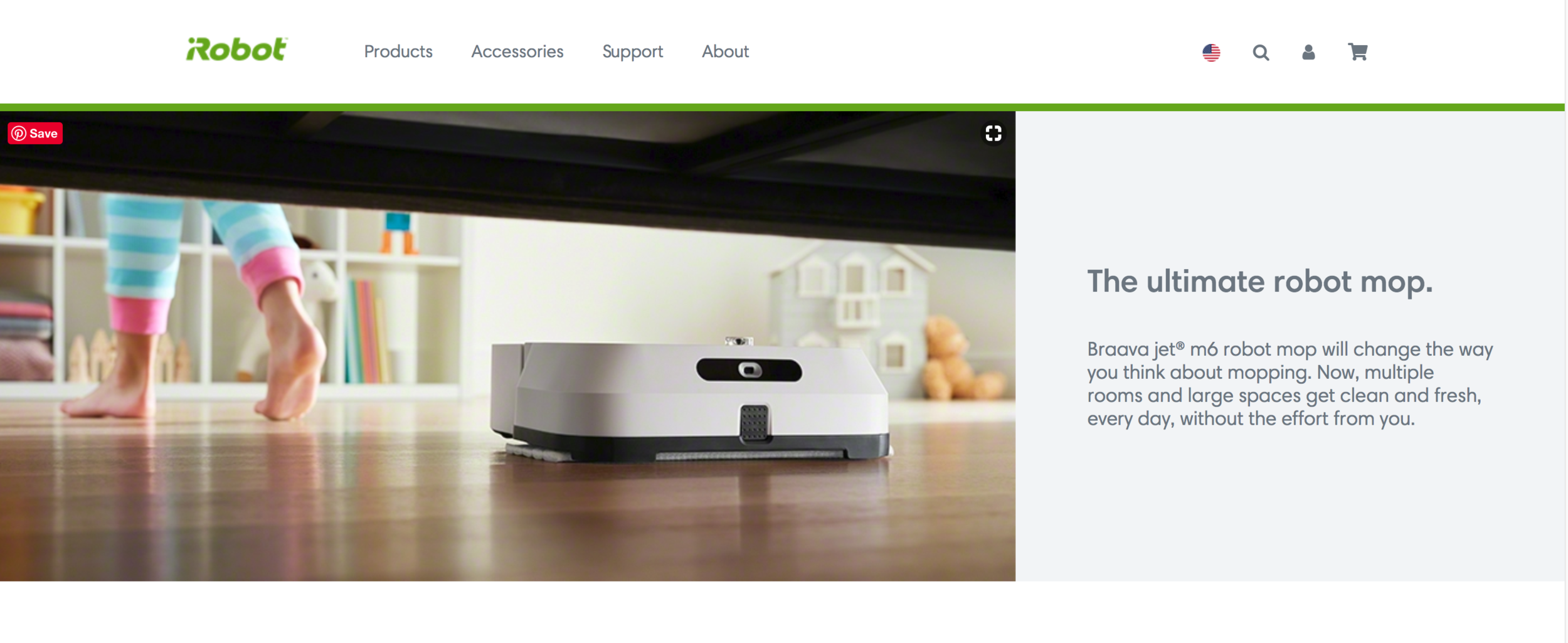 A robotic vacuum cleaner under a low table in a living room, with a child's legs visible in the background. A screenshot of iRobot's web site.