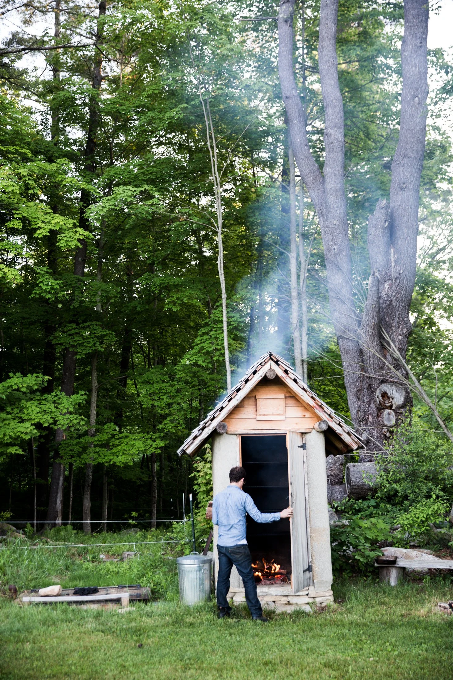 Opening the smokehouse.  Photographed for the book, The Smokehouse Handbook.