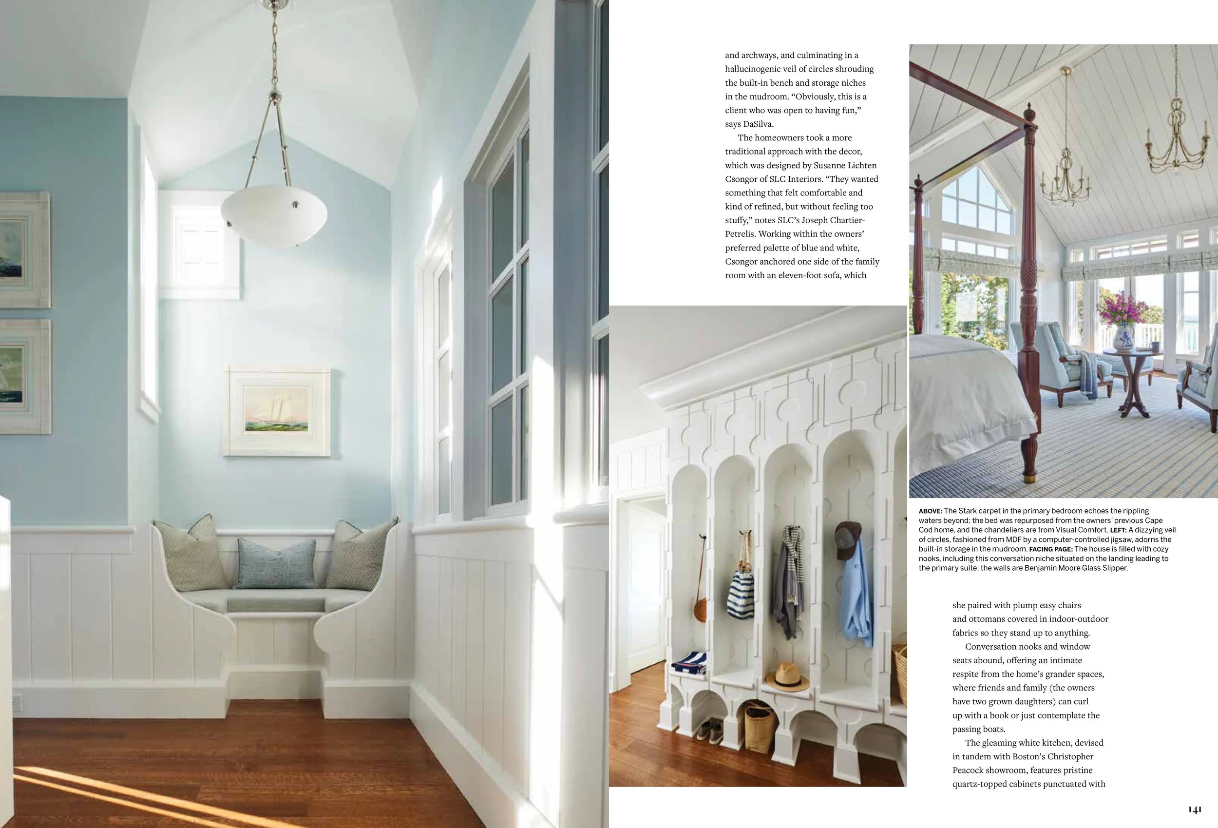 Interior of a bedroom with a four-poster bed, large windows with white trim, and a view of an outdoor patio or garden. There's a vase with flowers on a table near the window and a chandelier hanging from the ceiling.