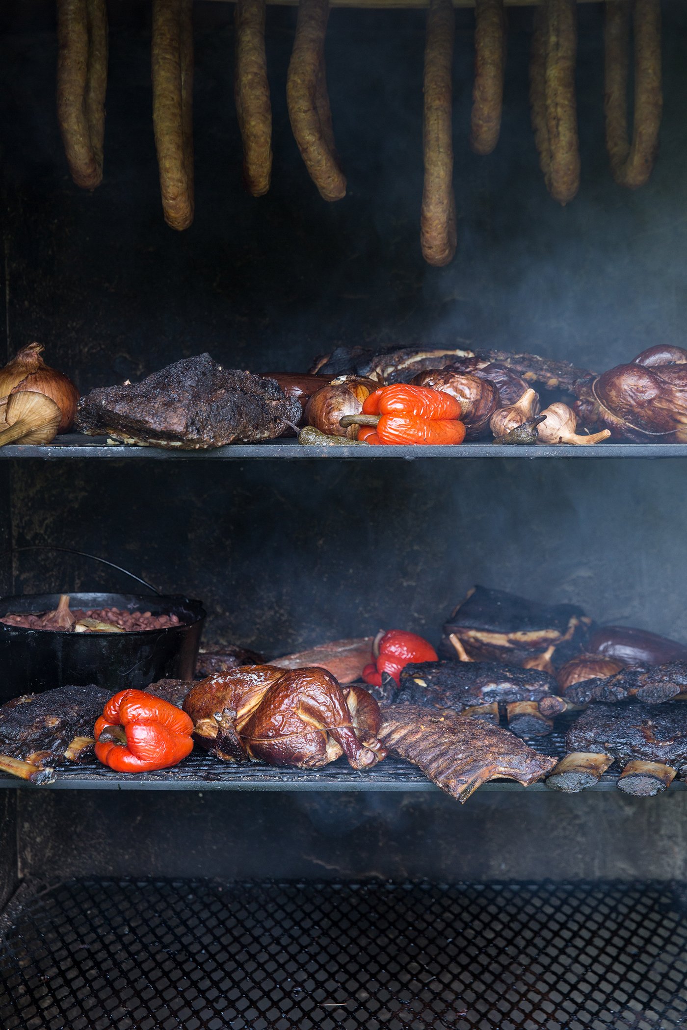 Shelves inside a smokehouse.