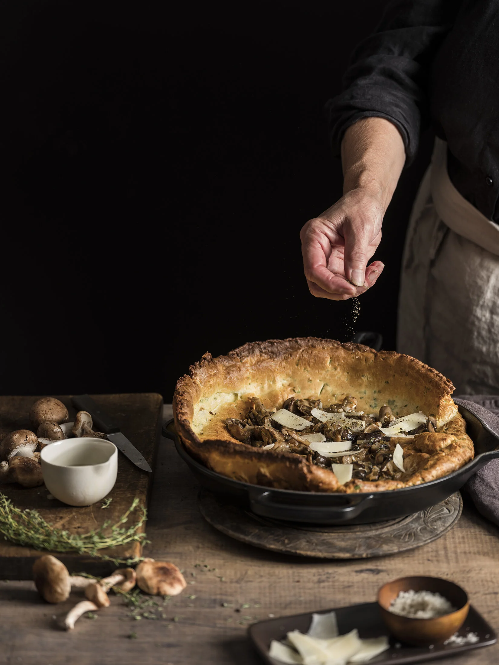 Savory Mushroom Dutch Baby photographed for a cookbook. Boston based food and hospitality photographer.