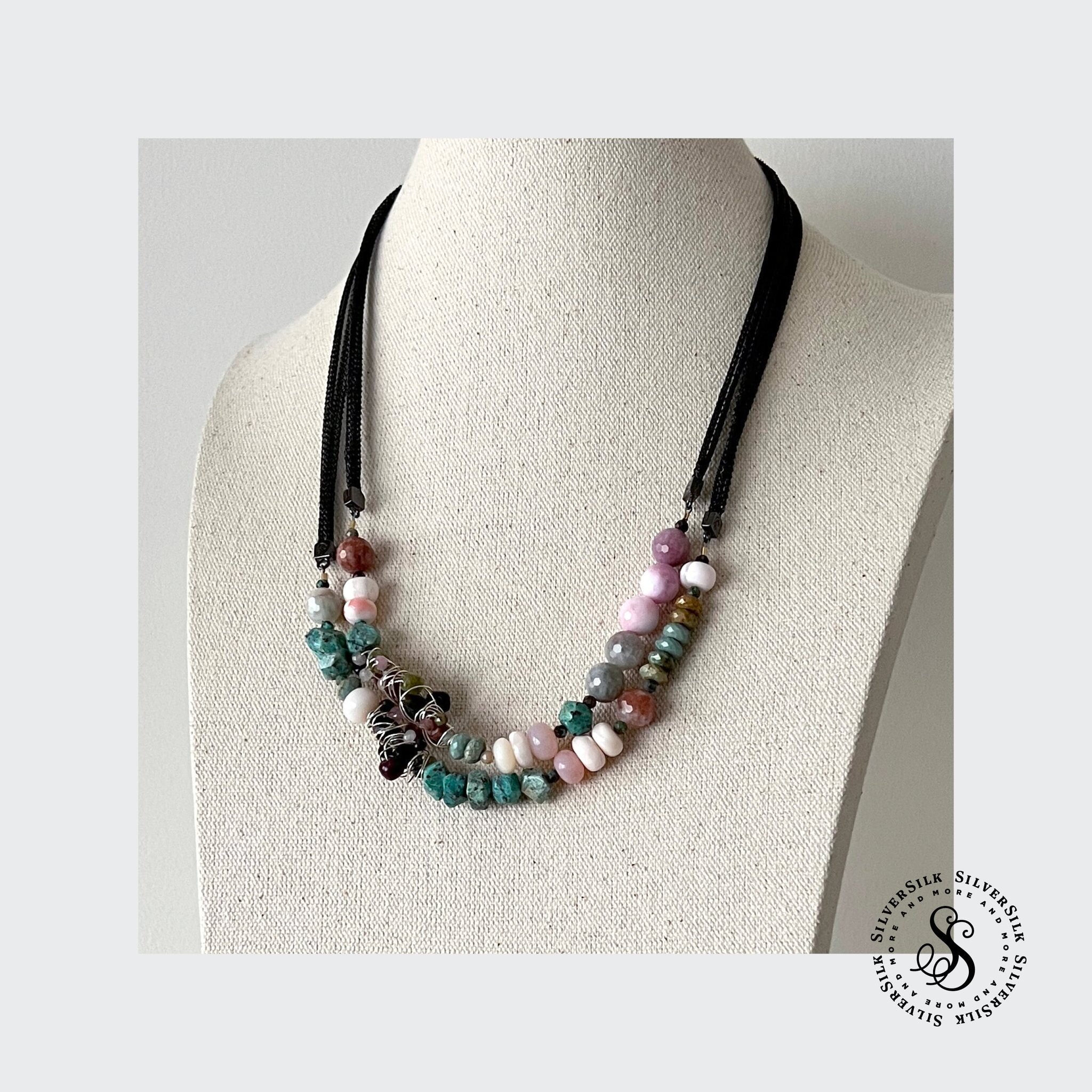 What do you think of my interpretation of the Sundance jewelry designs? Here, I double up on the chain lengths to add visual weight so it matches the gemstones visual weight. You can wear this design in several ways without worrying about a clasp. An