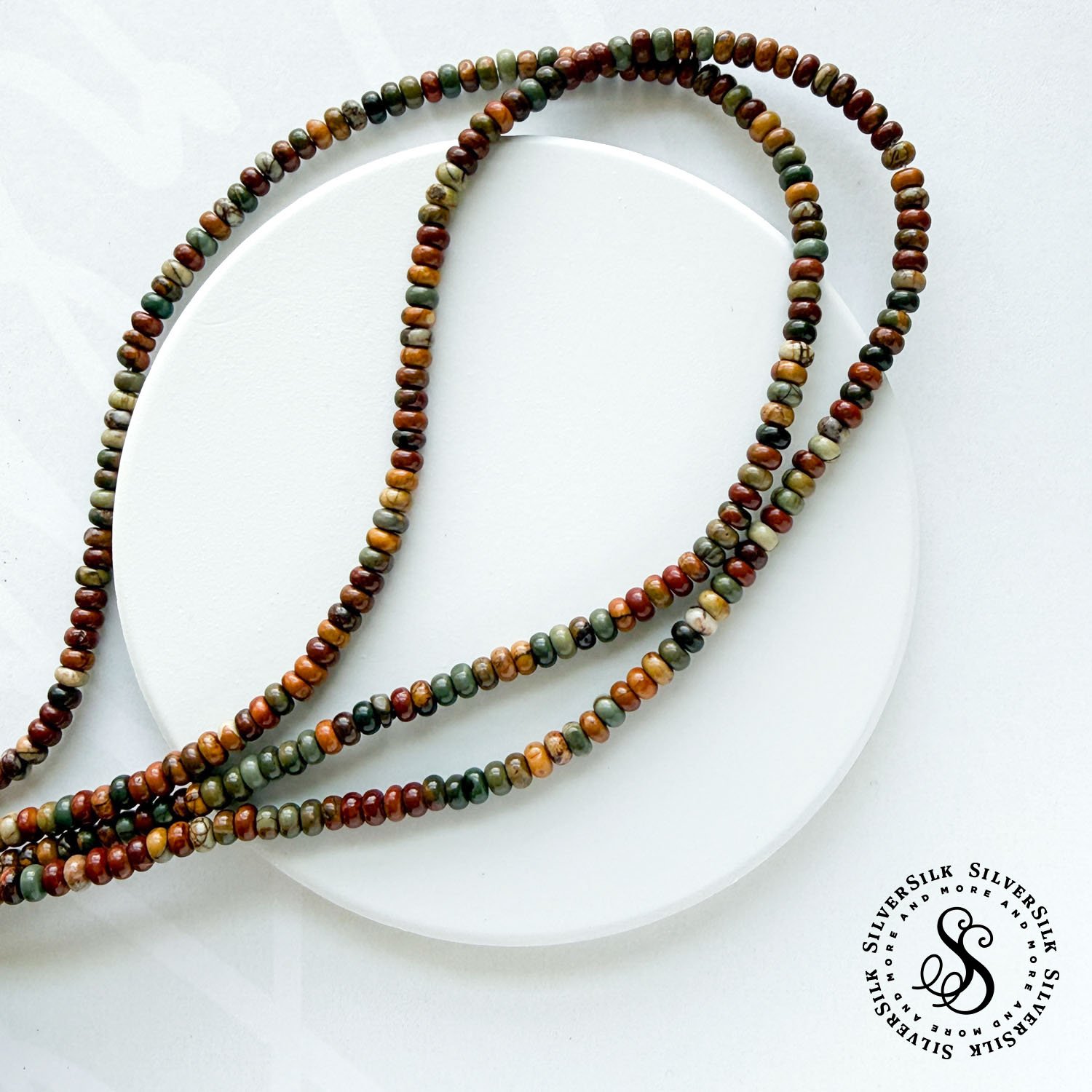 2x4mm Red Creek Jasper Smooth Rondelle Beads - 15in Strand.jpg