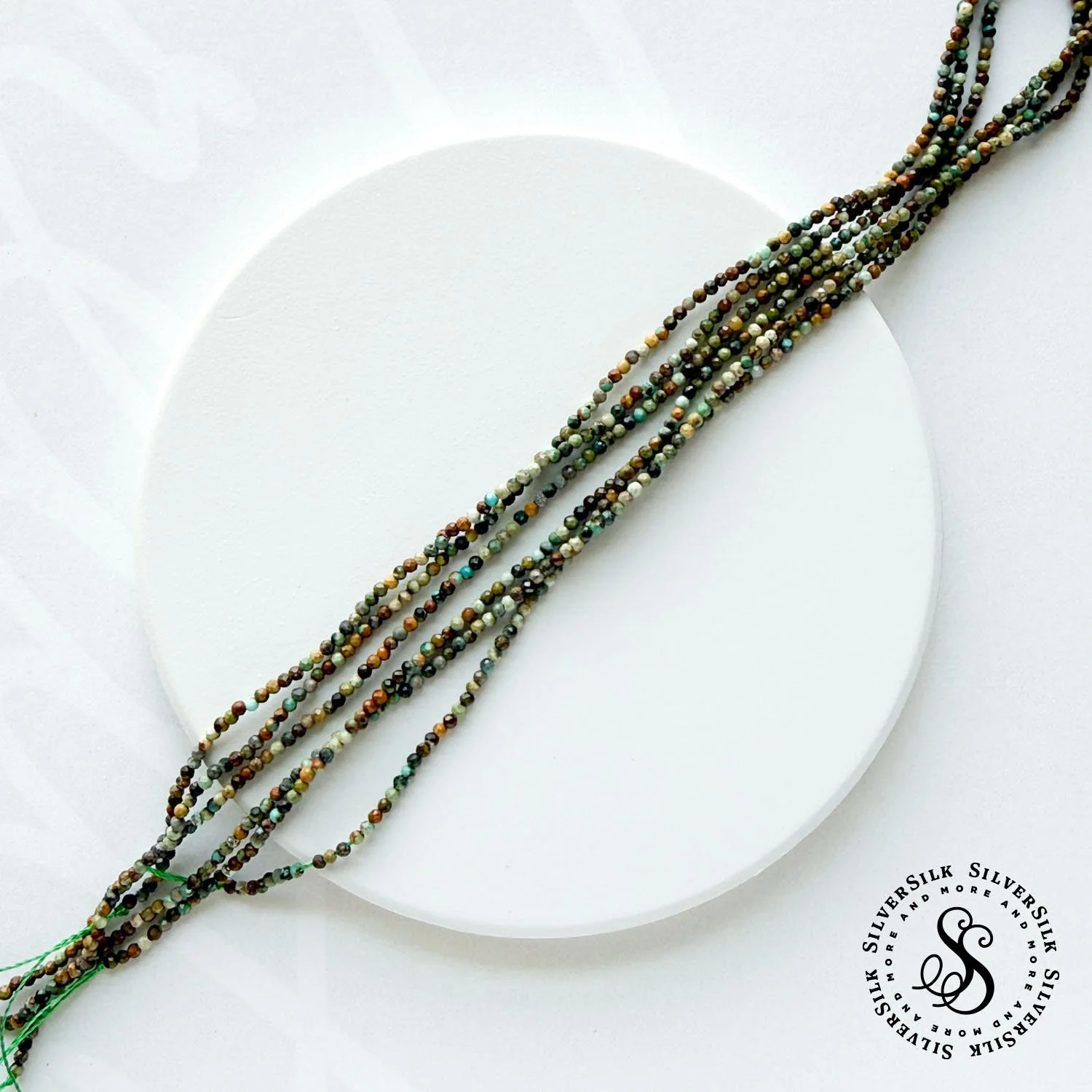 1.5mm Micro-Faceted Chinese Turquoise Round Beads - 15in Strand.jpg