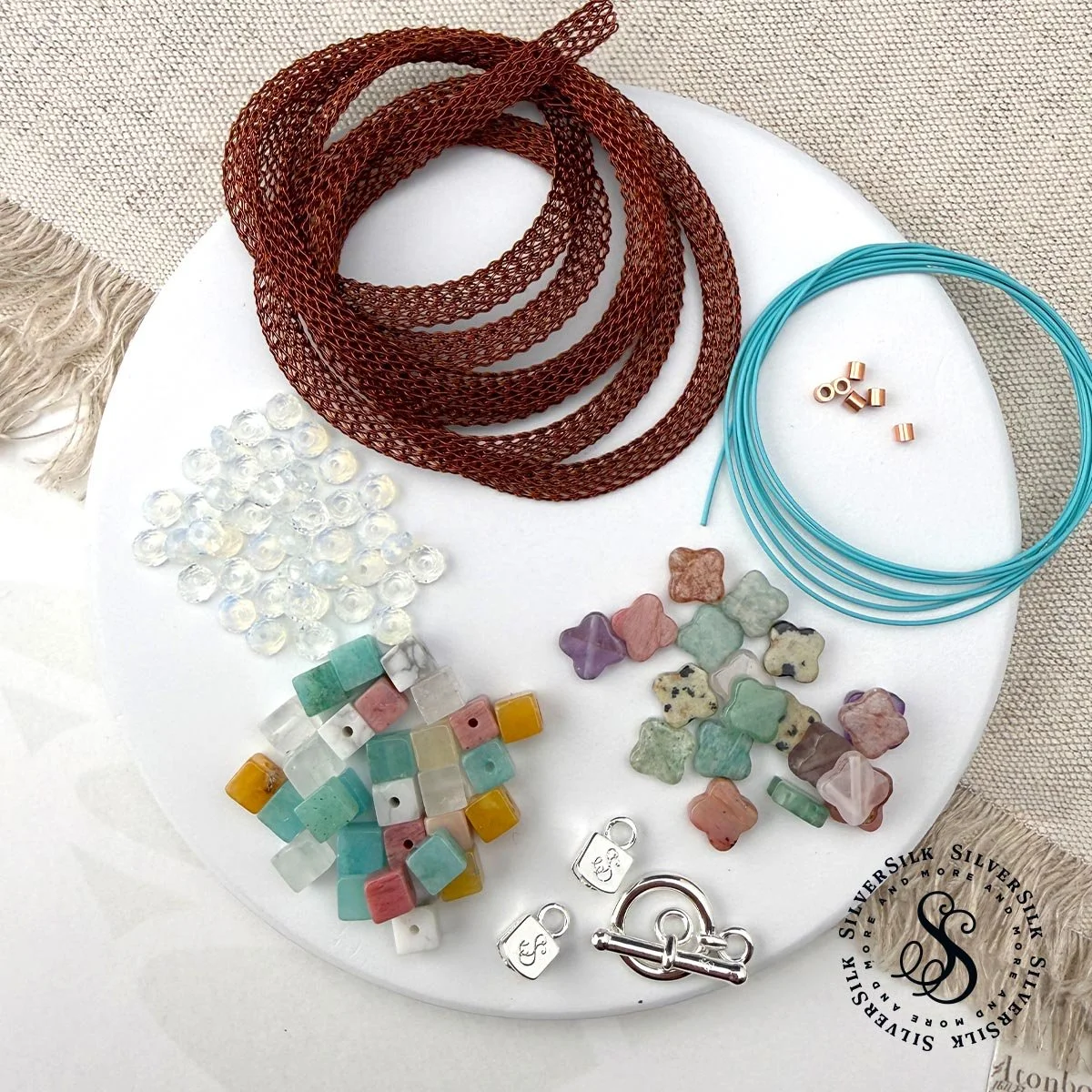 The Cubist Quatrefoil Necklace_Materials_Website Button.jpg