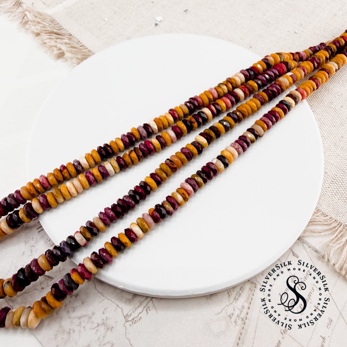 2x4mm Faceted Mookaite Rondelle Gemstone Beads - 7.5in Strand