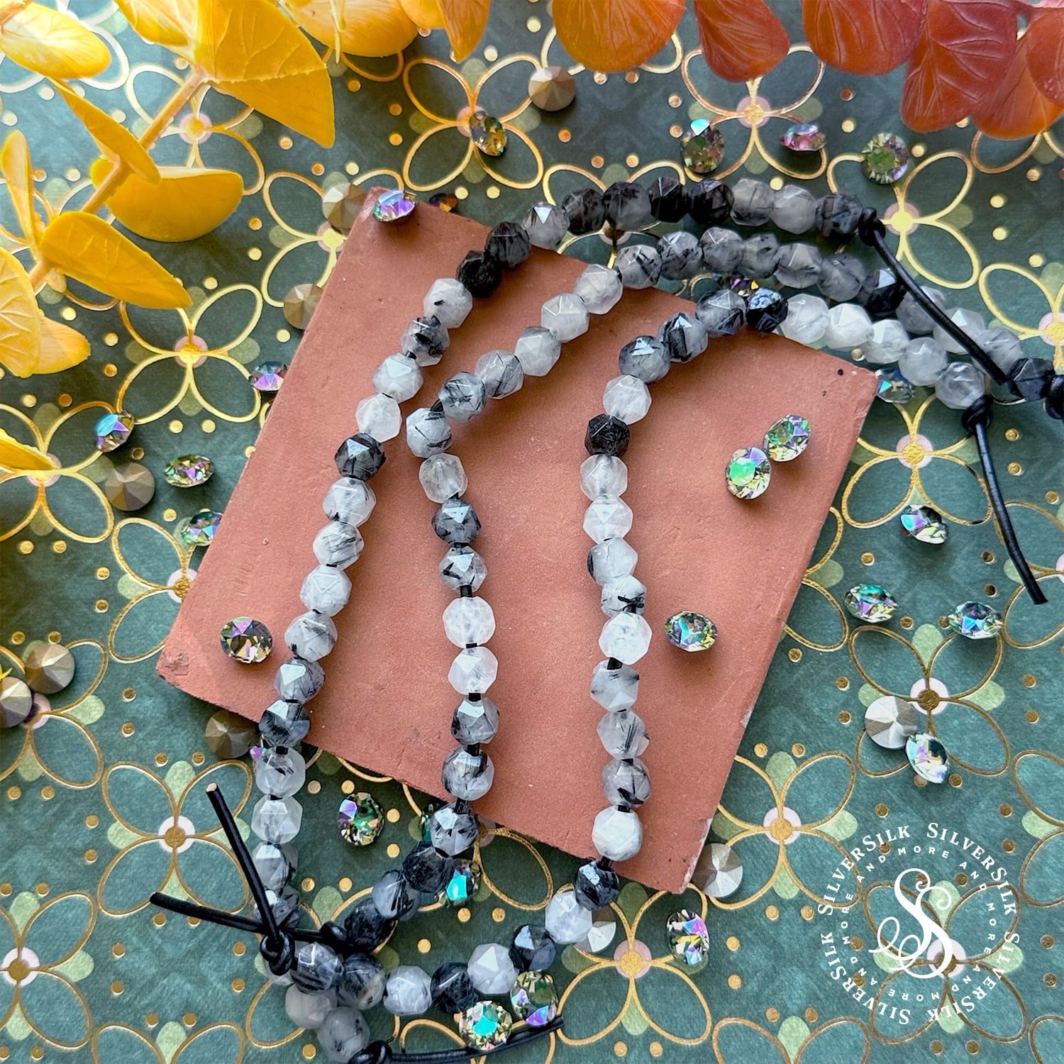 7mm Soft-faceted Rutilated Quartz 2.5mm-hole Agate Beads - 8in Gemstone Strand