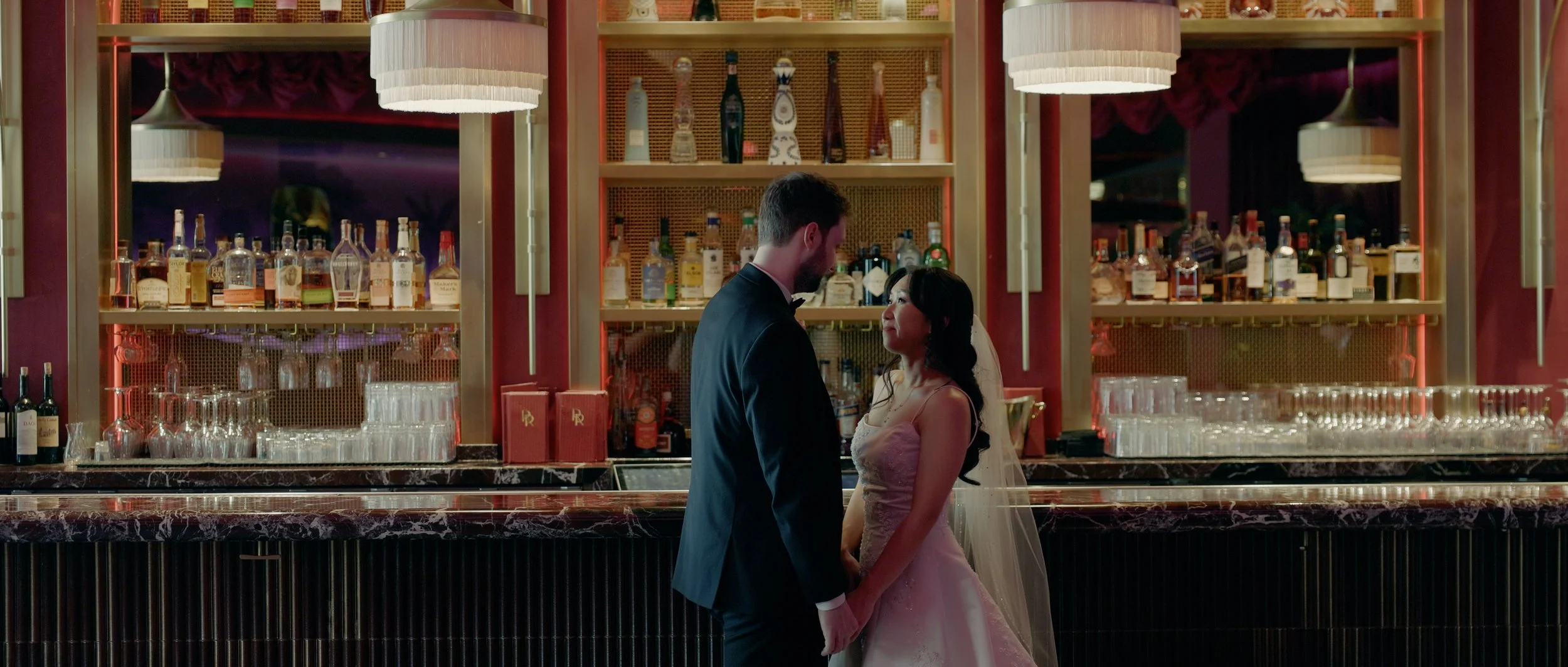 Moody wedding portraits of Zachary and Ivana inside Red Rock Casino Resort.
