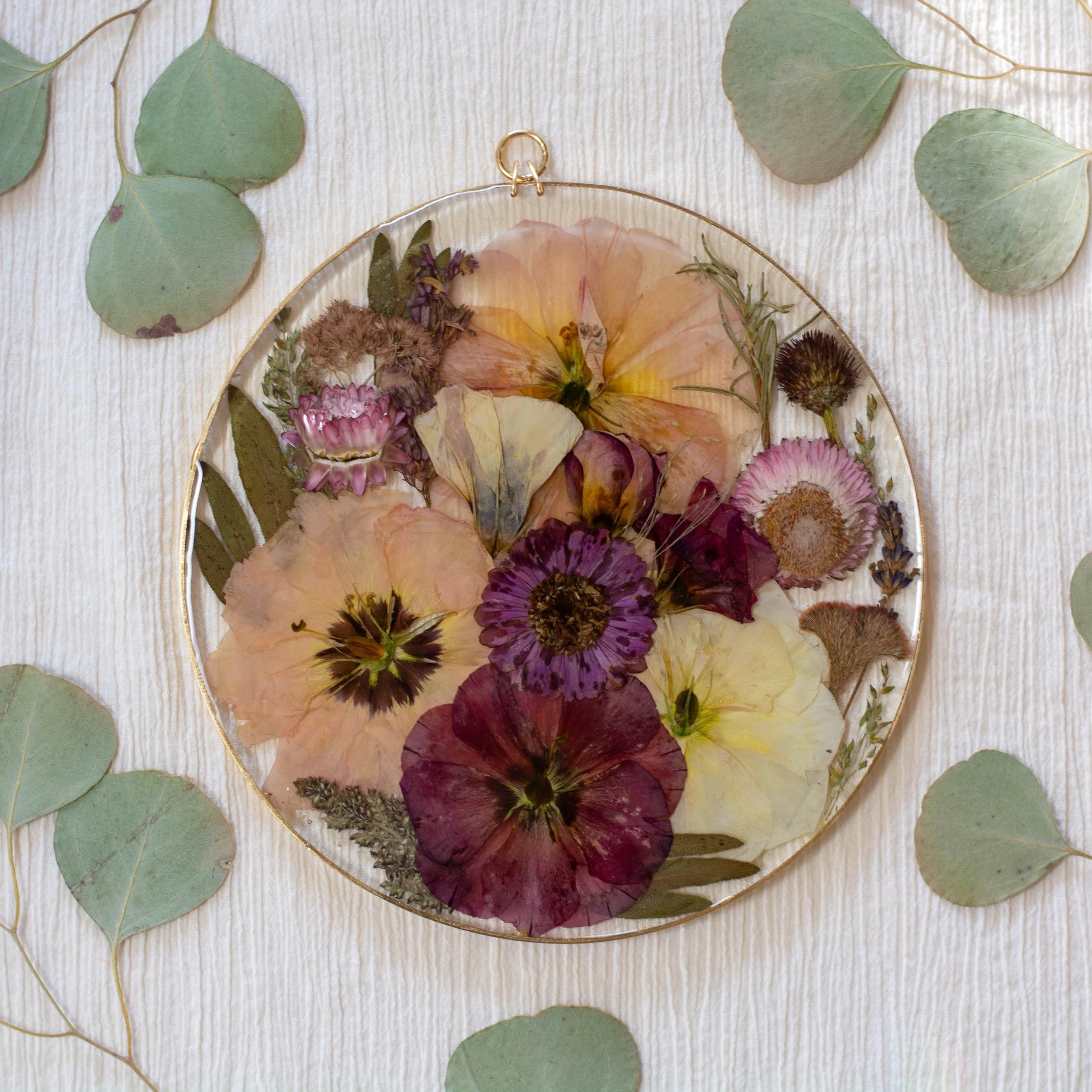 8" brass wall hanging with resin