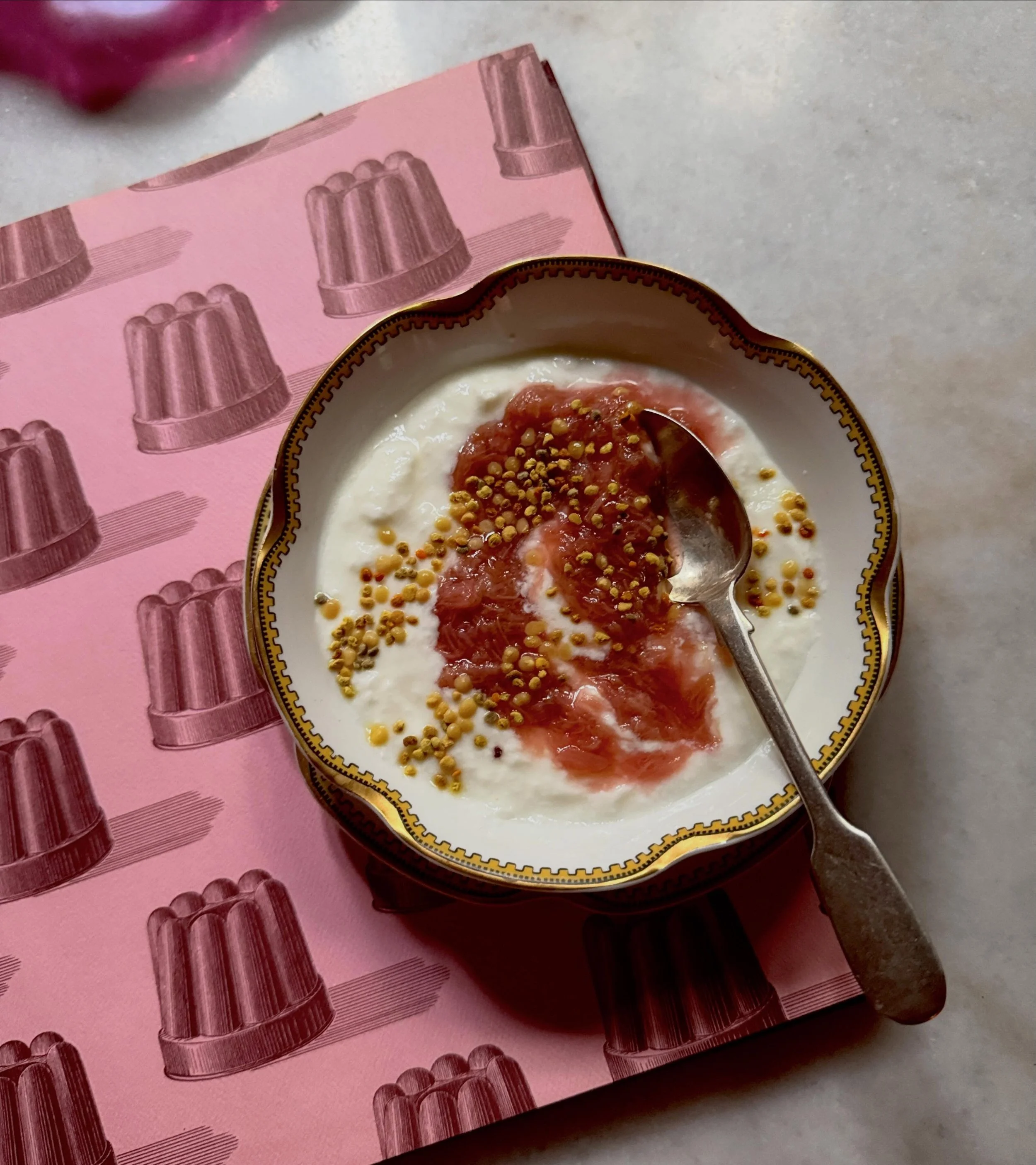 Still enjoying rhubarb season ! Breakfast of champions ! Reading dessert books. ! For a compote of rhubarb . I bought a lb rhubarb . Trim , wash and slice the stems  into half inch pieces and add to med saucepan . Add a couple tablespoons of sugar (-