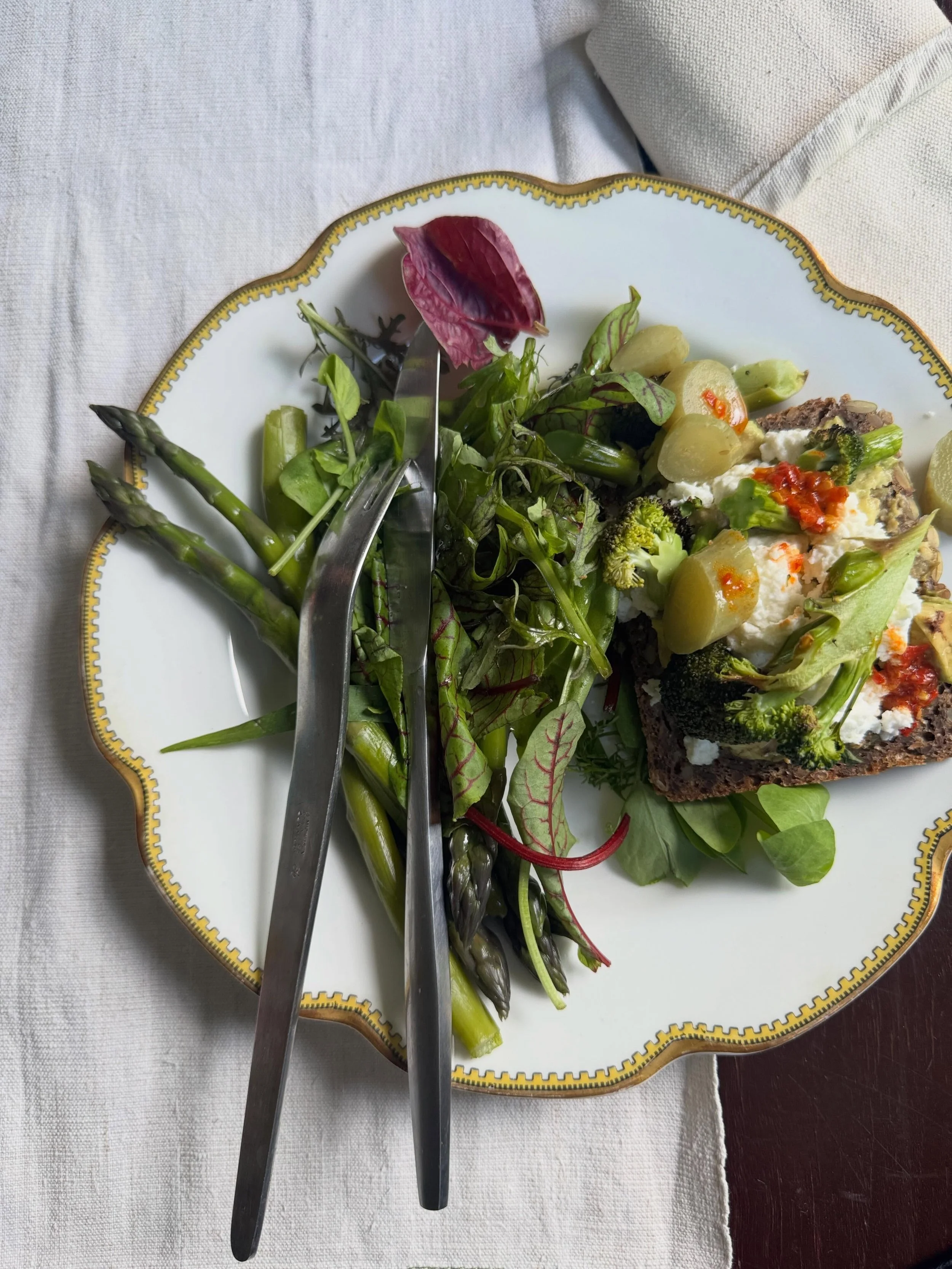 Simple brunches on rainy holiday weekend . Perfect time of year at the farmers market to buy all springs bounty - asparagus , greens , herbs , local eggs . We can shop locally - outside and from small farms no middle men so profits go directly to the