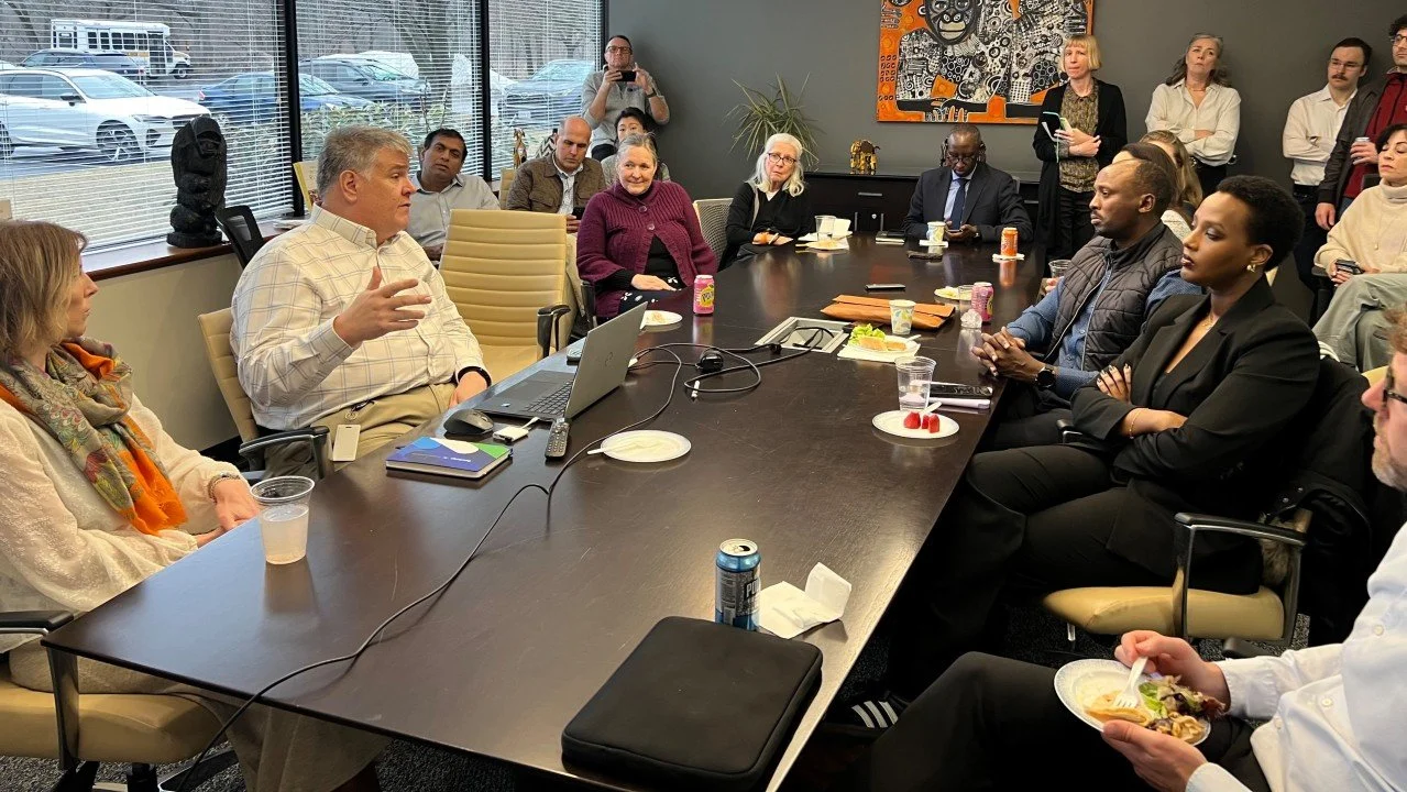 Dr. Daryl DRUMMOND, Left center; Minister Dr. NSANZIMANA Right center
