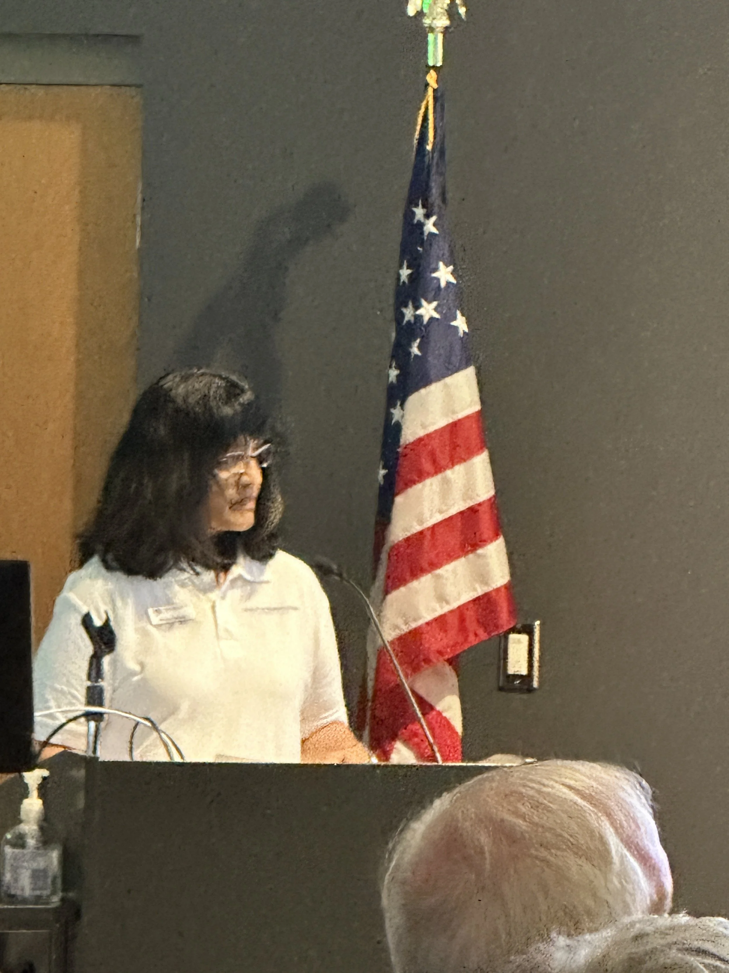 Priya welcomes the attendees.