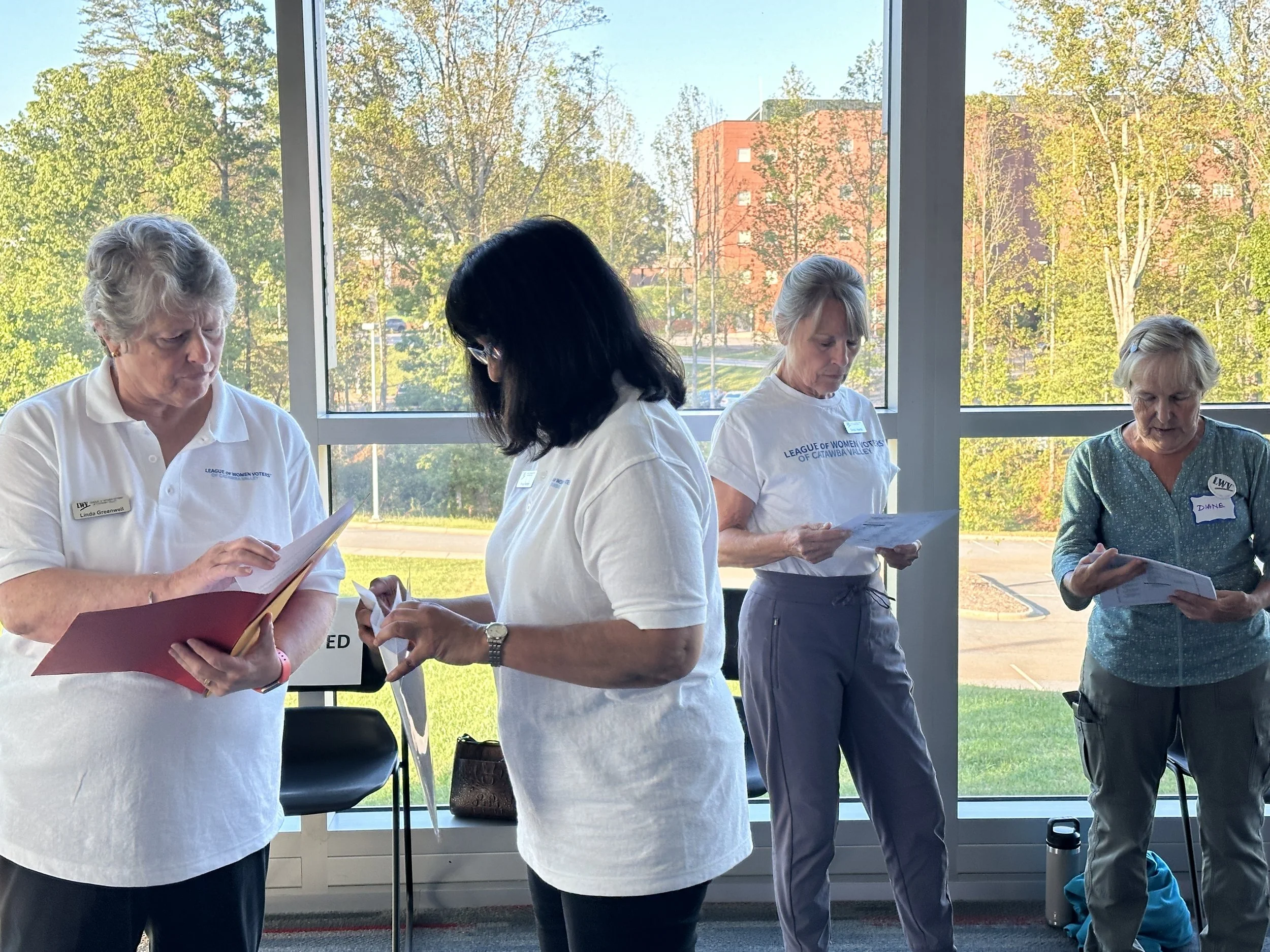 Leaguers review plans for the evening.