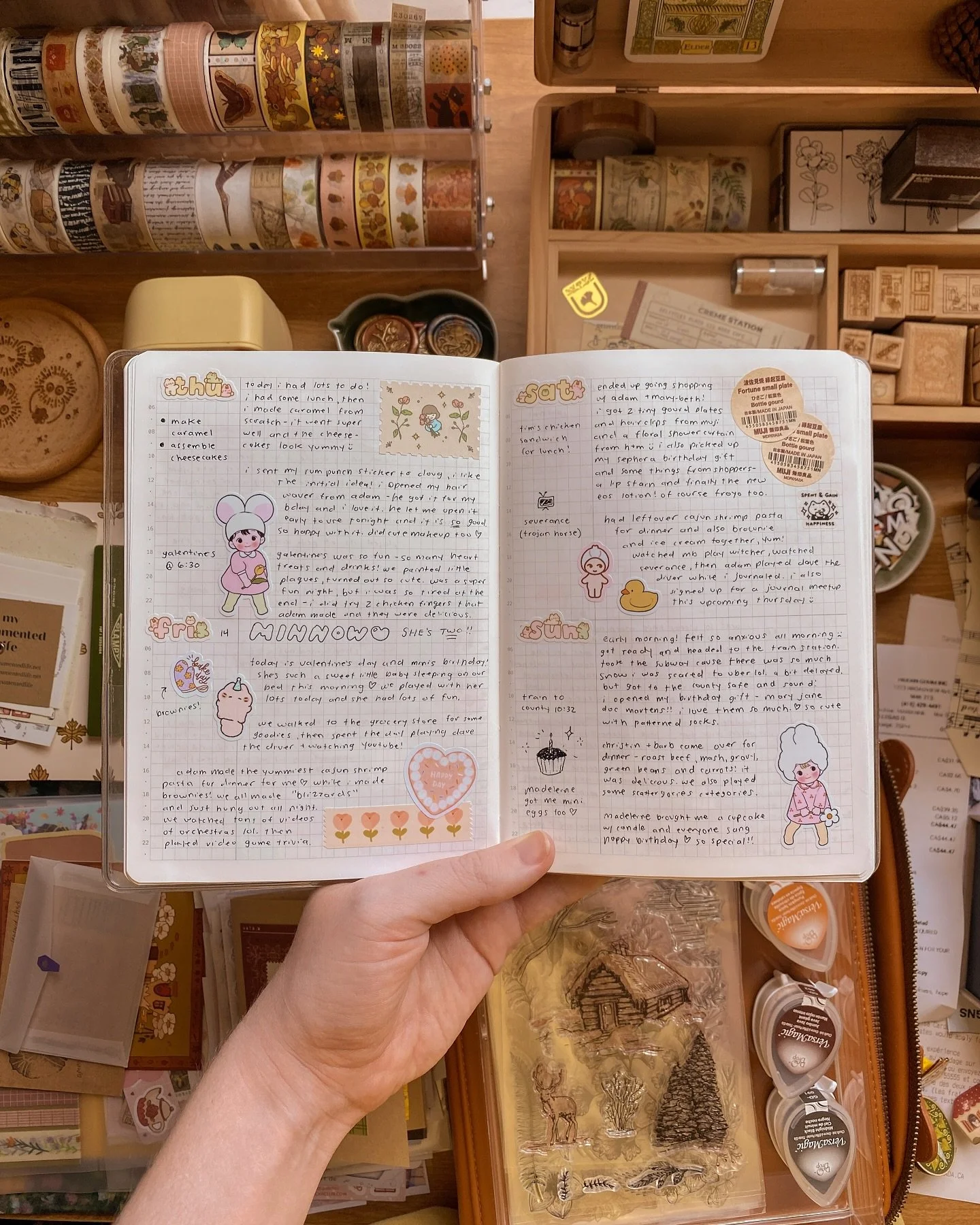 desk is so messy that i had to hold up my journal for a photo😅 but! it&rsquo;s finally feeling a bit like spring in toronto and i&rsquo;m very very happy about the sunshine. finally feeling a little more motivated lately too, working on new products