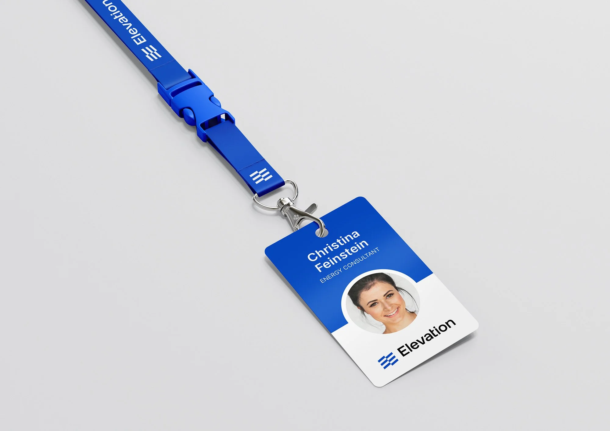 Blue lanyard with a name badge featuring a photo of a person, labeled as "Energy Consultant" and displaying the "Elevation" logo.