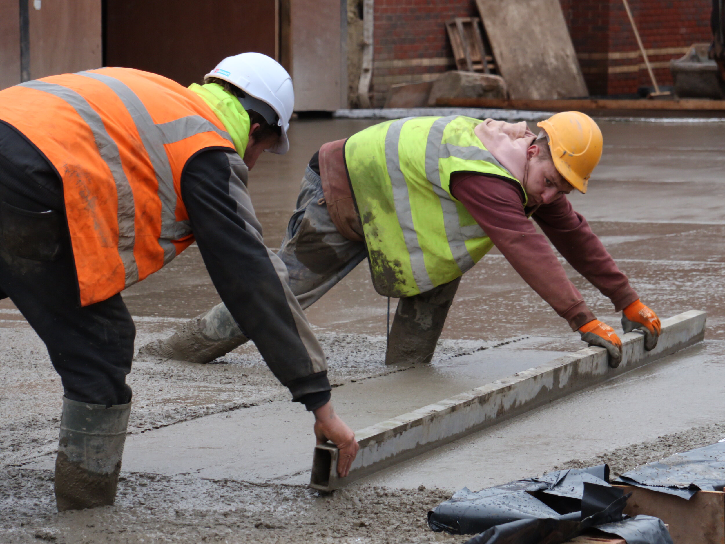 Laying the slab base for the new retail extension.